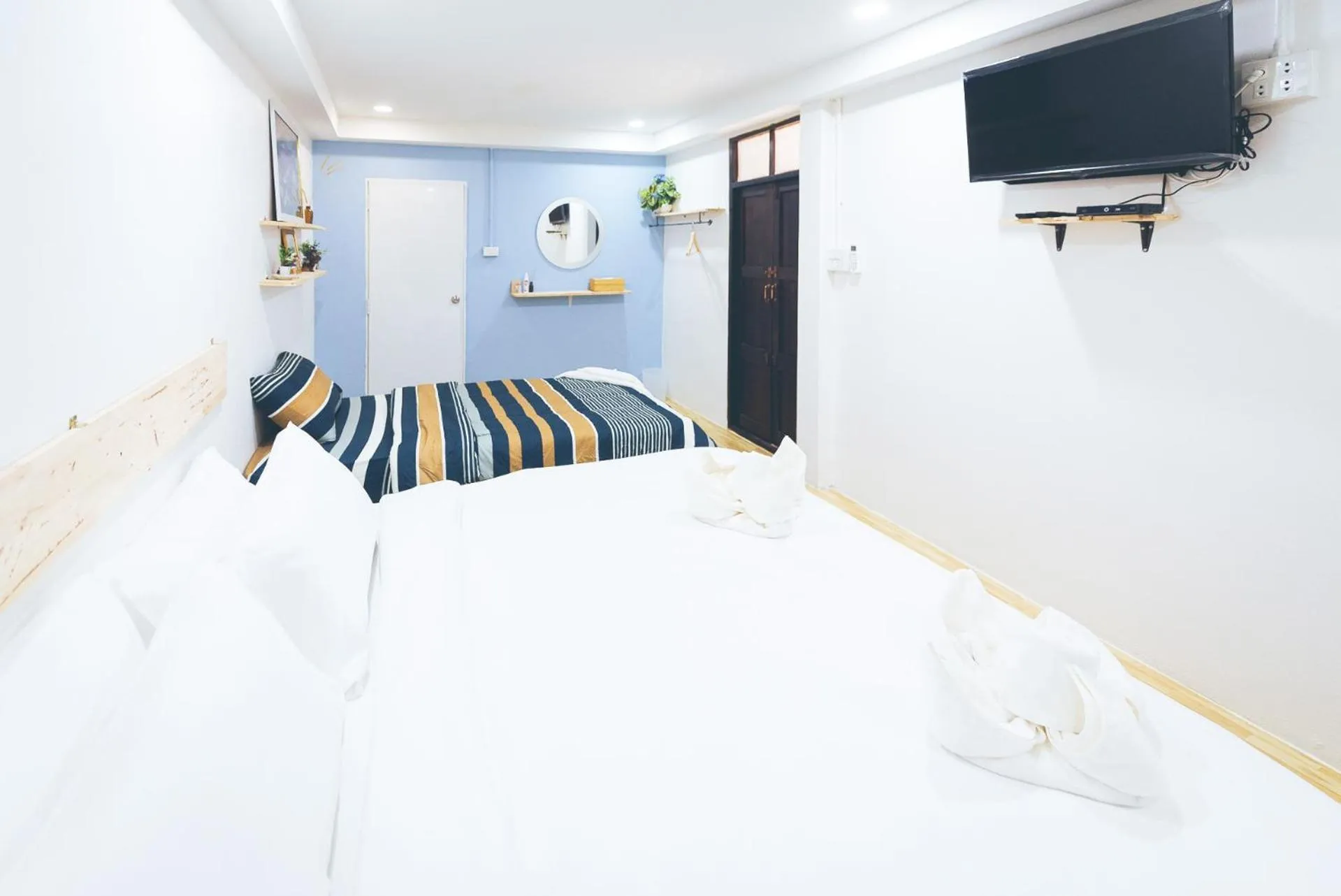 Bed in Wang Jai Kwang Space Inn