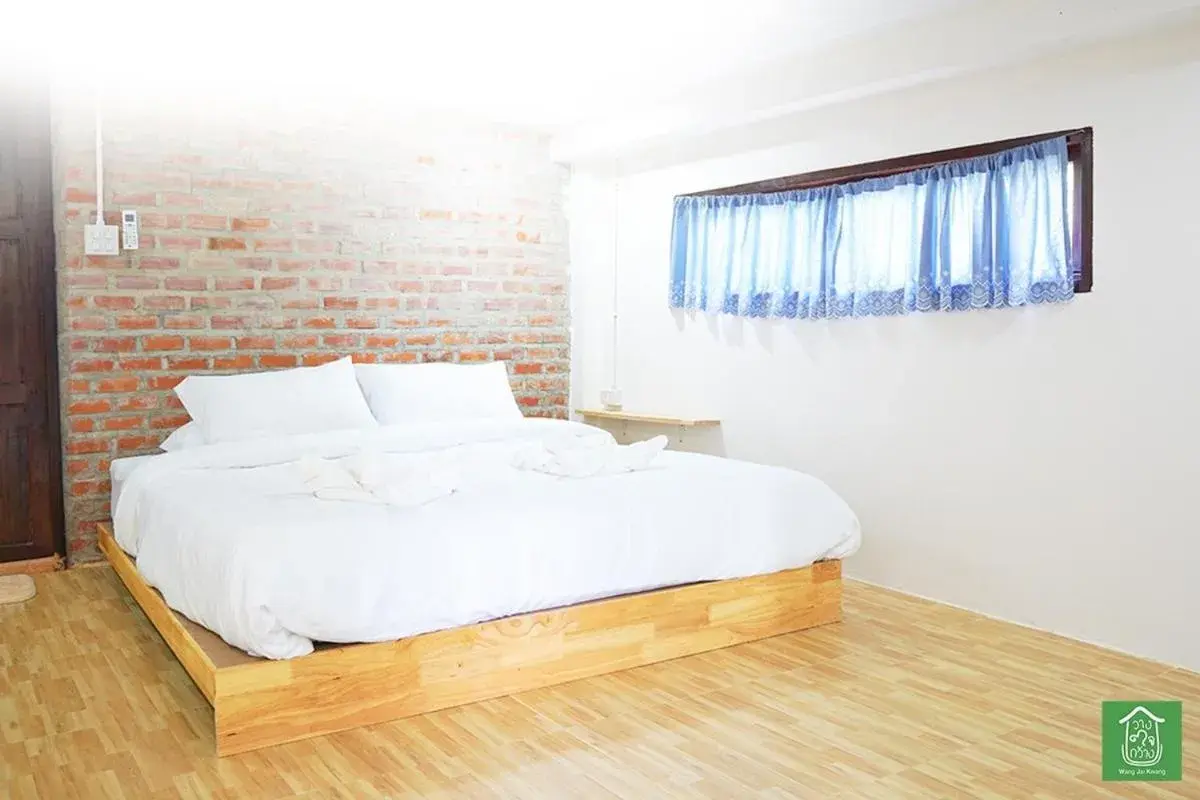 Bed in Wang Jai Kwang Space Inn Bed in Wang Jai Kwang Space Inn