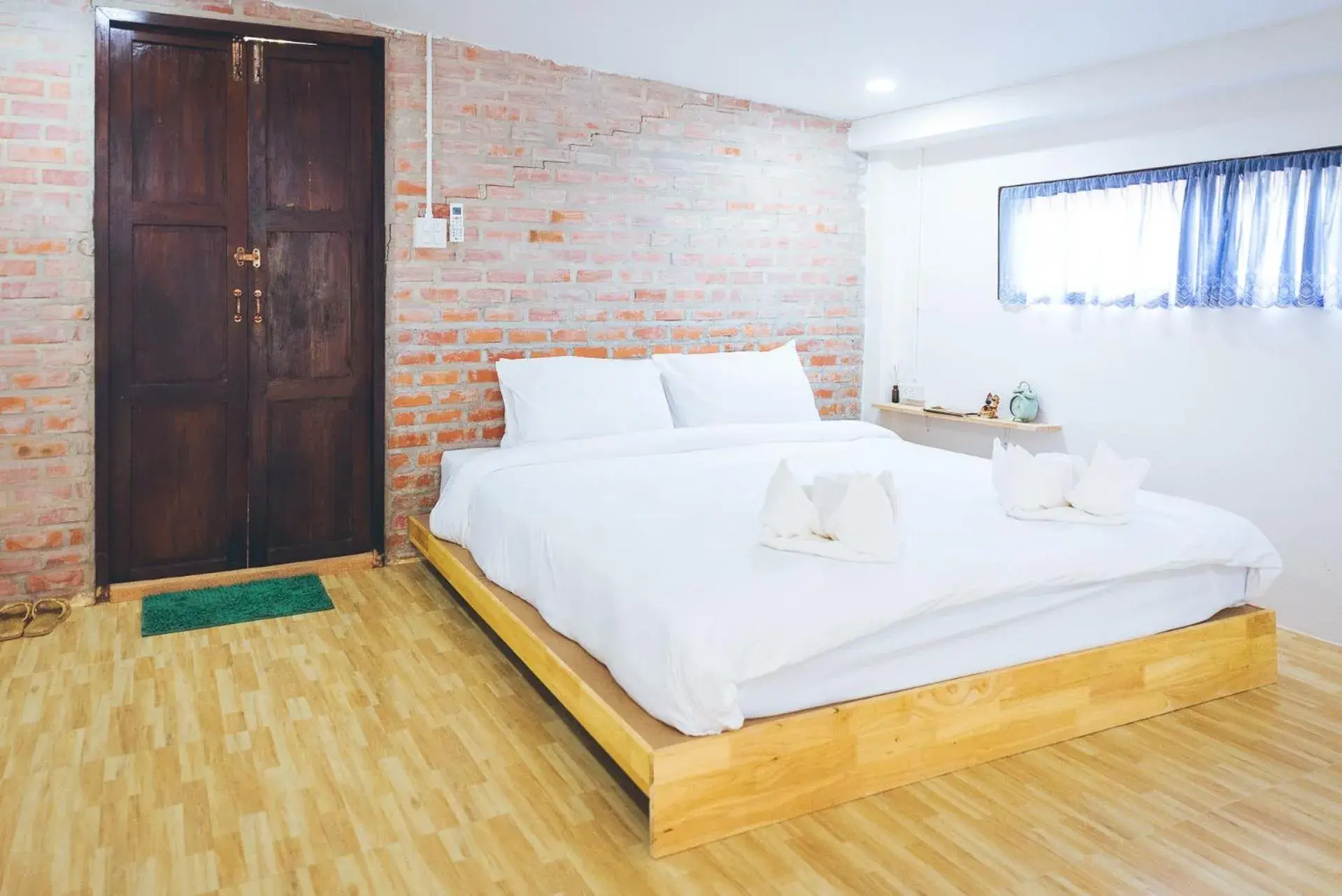 Bed in Wang Jai Kwang Space Inn Bed in Wang Jai Kwang Space Inn