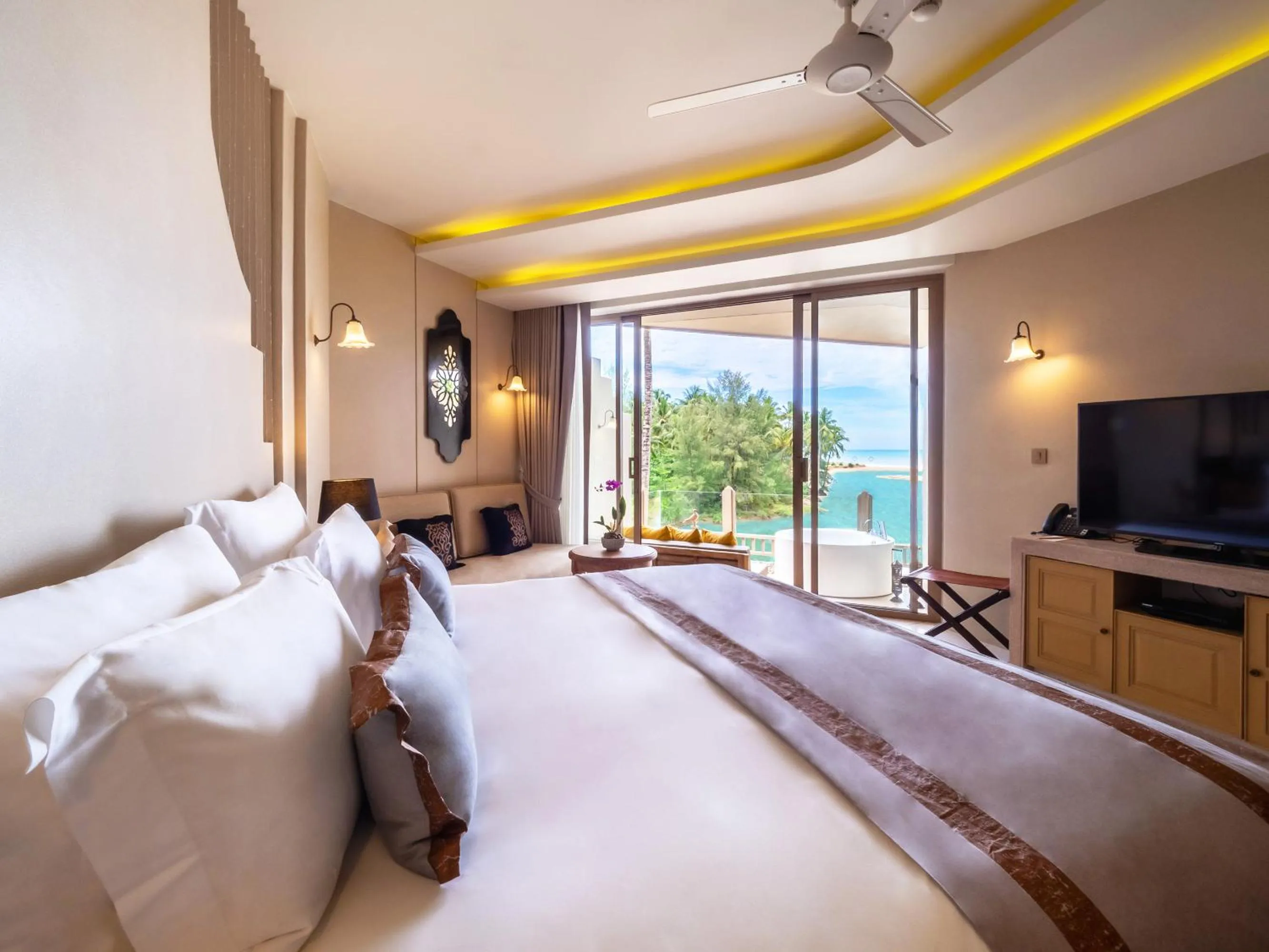 Bed in Devasom Khao Lak Beach Resort & Villas