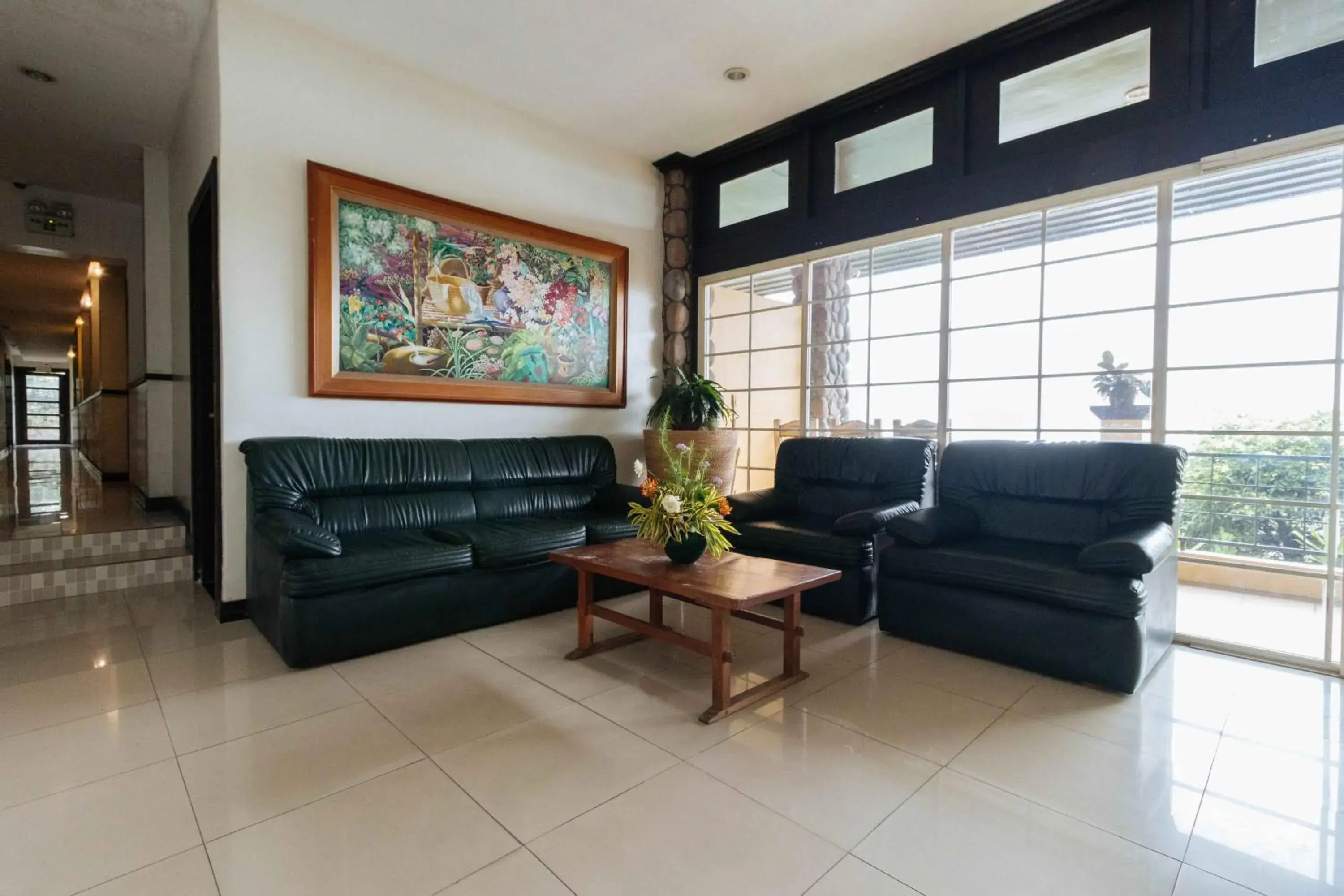 Living room in RedDoorz Plus at The Ridge Tagaytay Living room in RedDoorz Plus at The Ridge Tagaytay