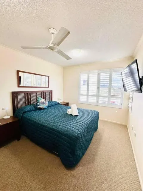 Bed in On The River Apartments