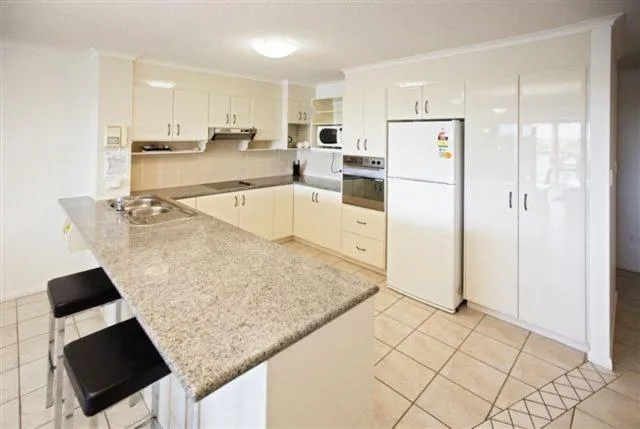 Kitchen or kitchenette in On The River Apartments