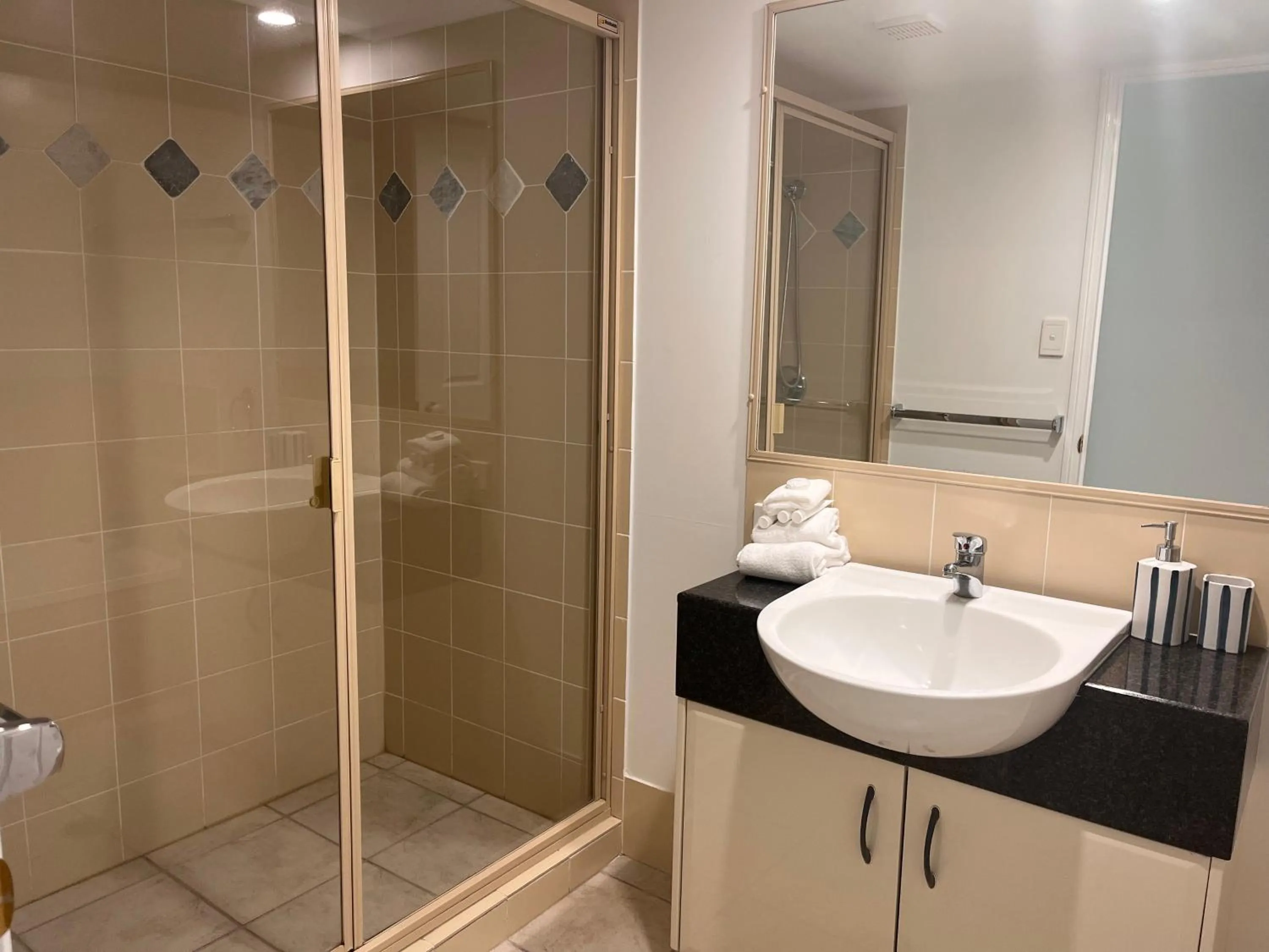 Shower in On The River Apartments