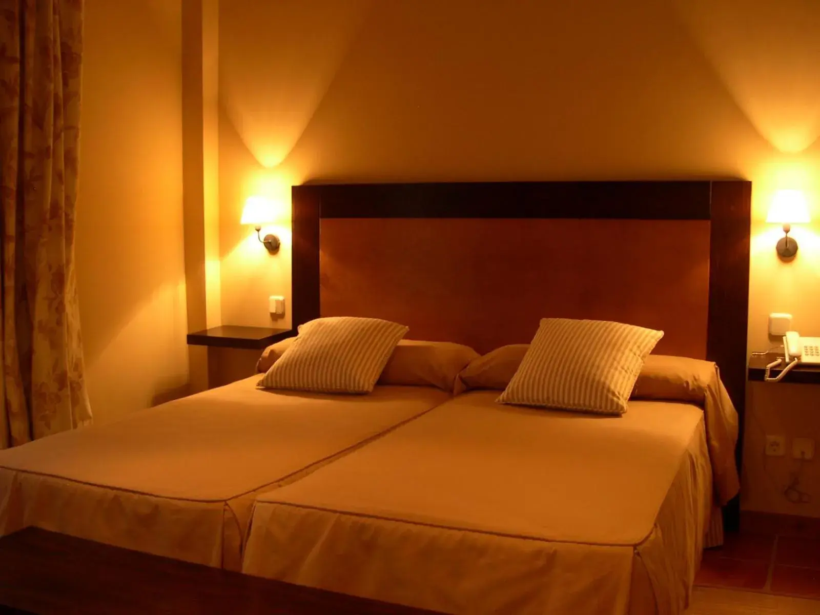 Twin Room in Hotel Rural El Jardin de la Hilaria Twin Room in Hotel Rural El Jardin de la Hilaria