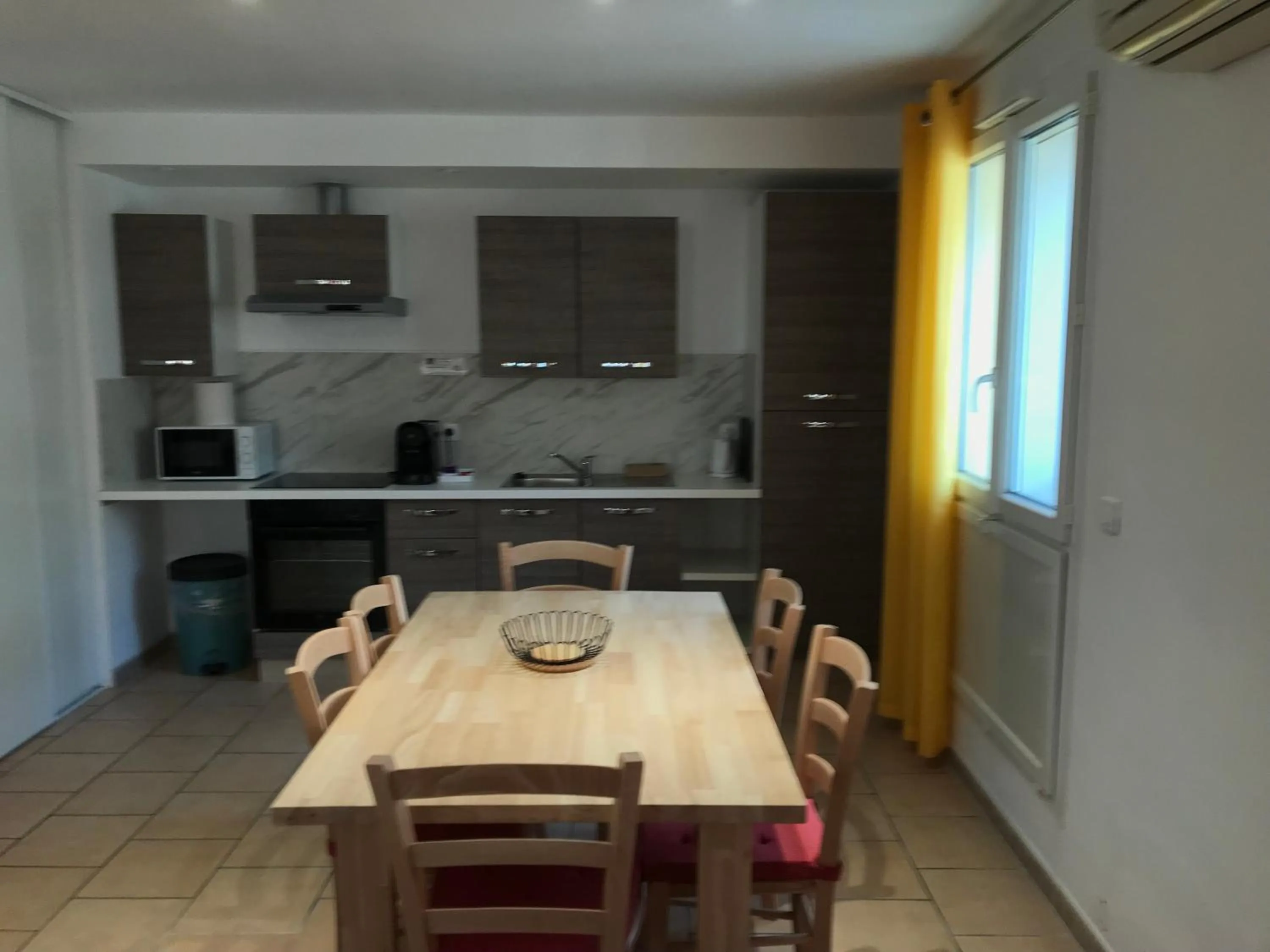 Kitchen or kitchenette in Privilège Hôtel & Apparts Eurociel Centre Comédie