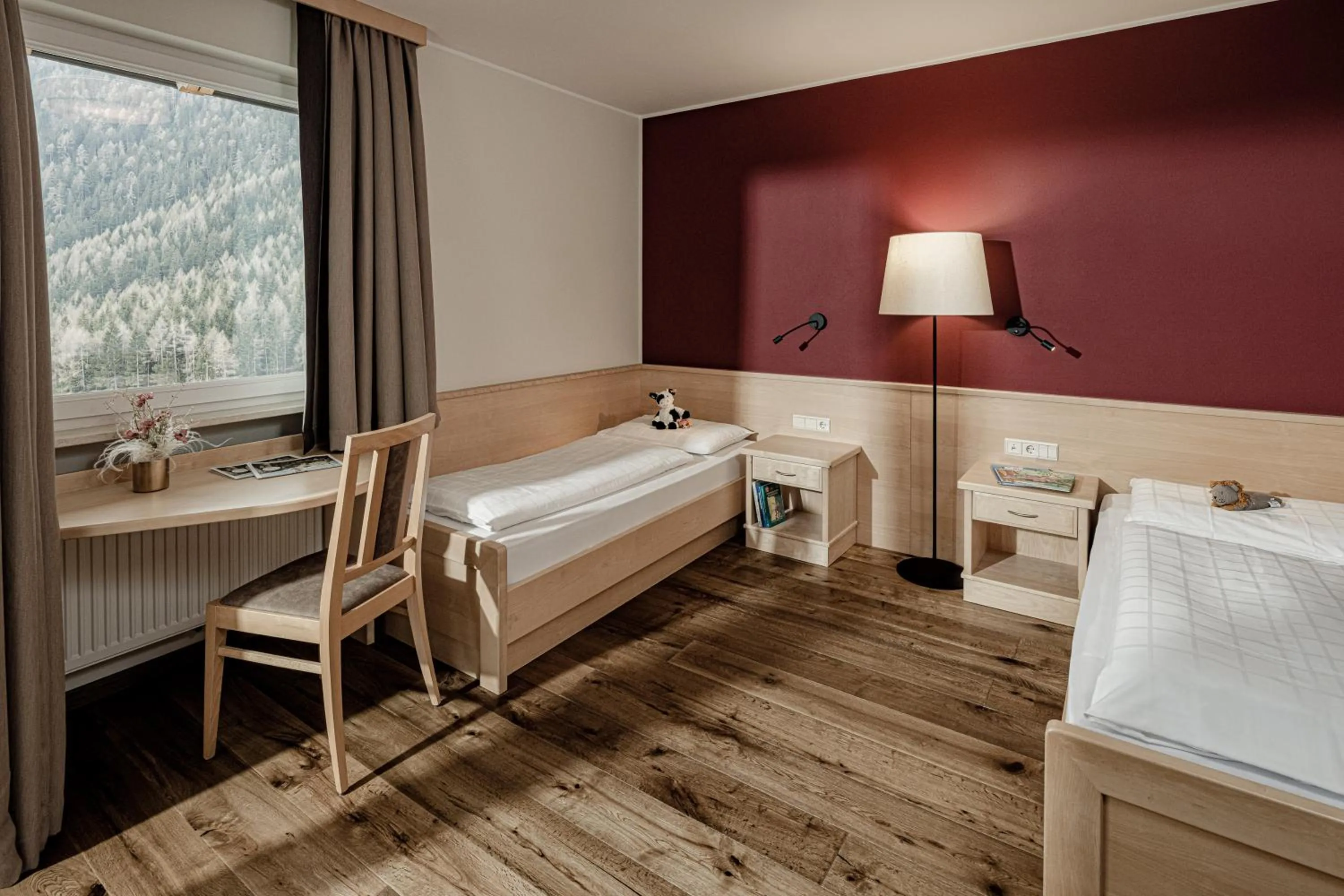 Living room, Bed in Hotel Masl