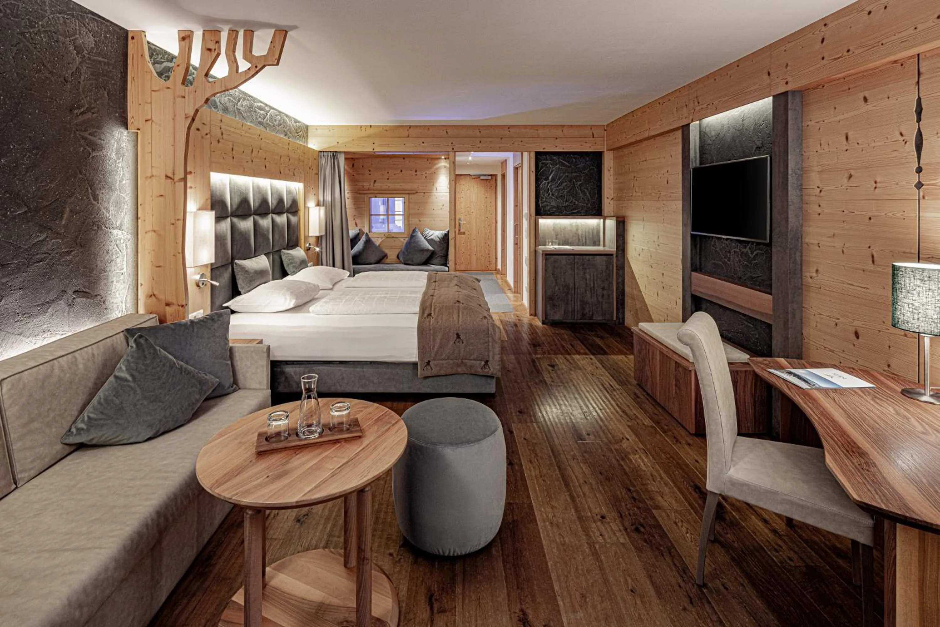 Living room, Bed in Hotel Masl