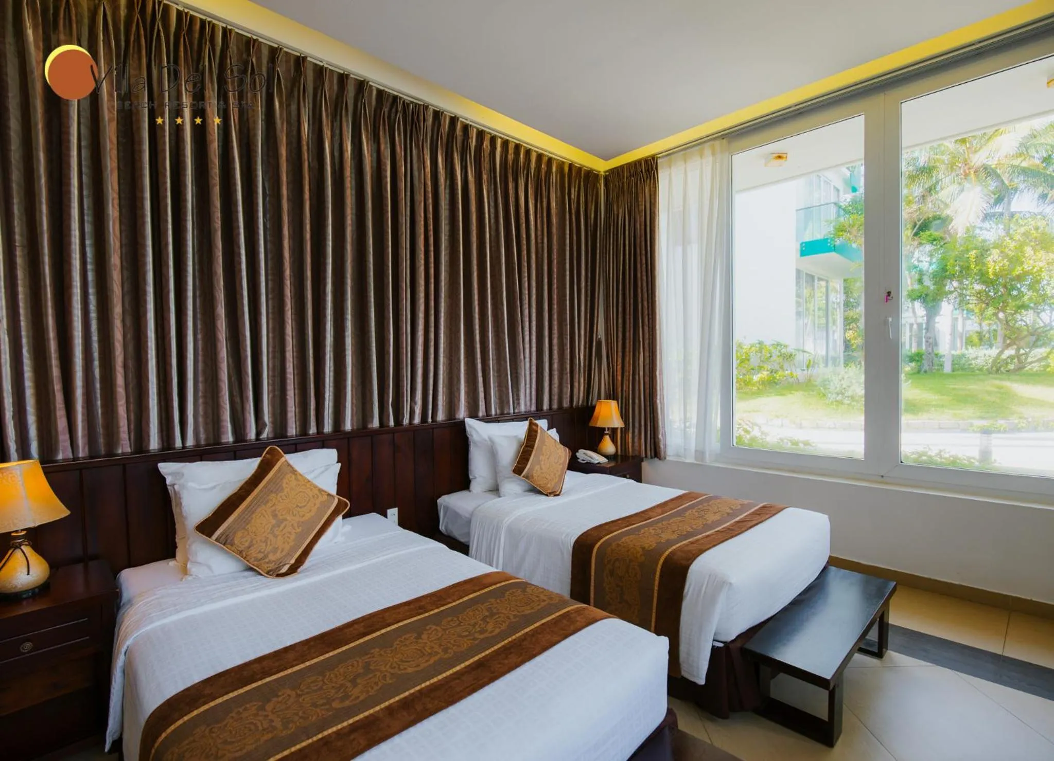 Property building, Bed in Villa Del Sol Beach Resort & Spa