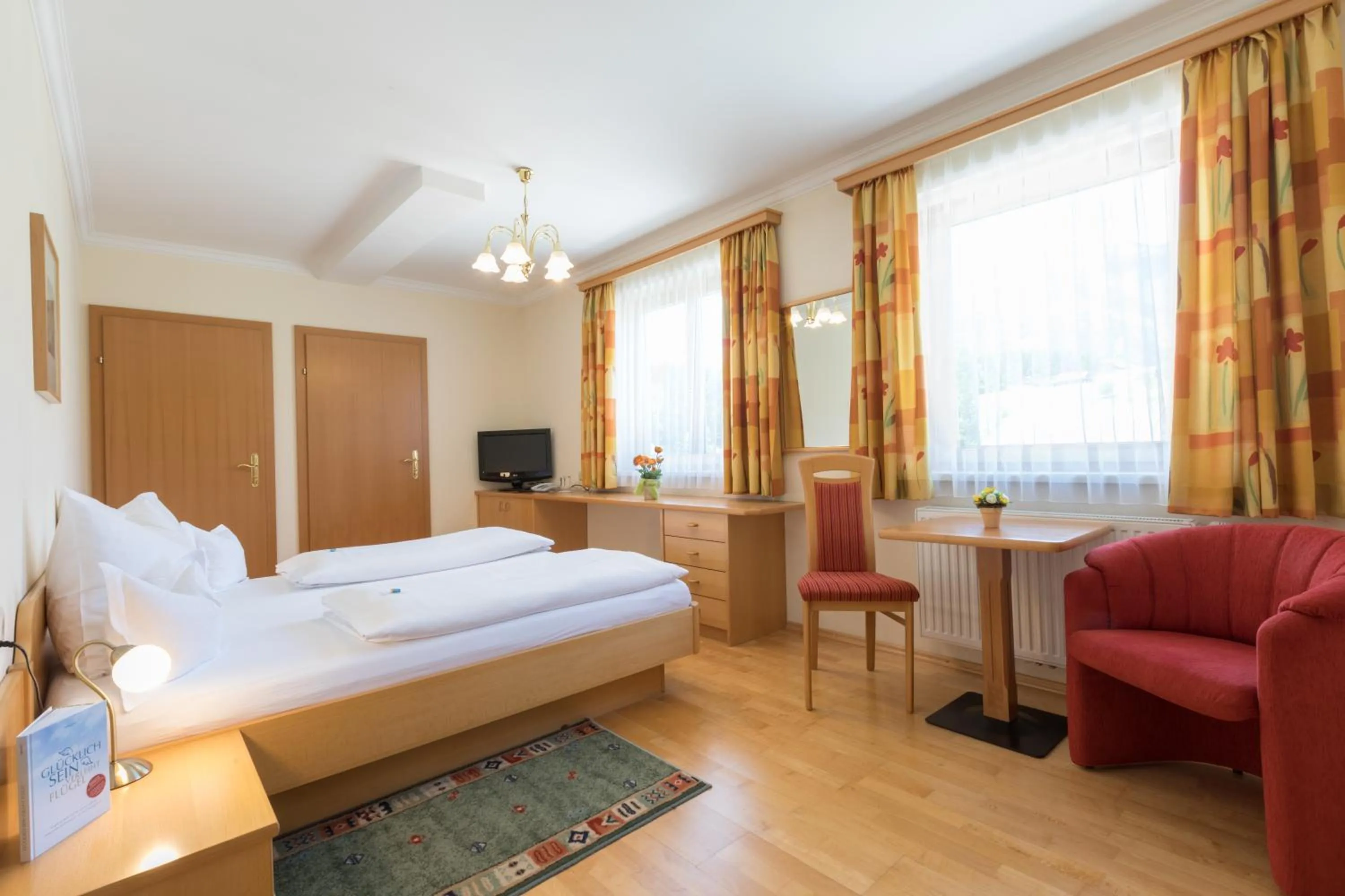 Photo of the whole room, Bed in Landhotel Häuserl im Wald