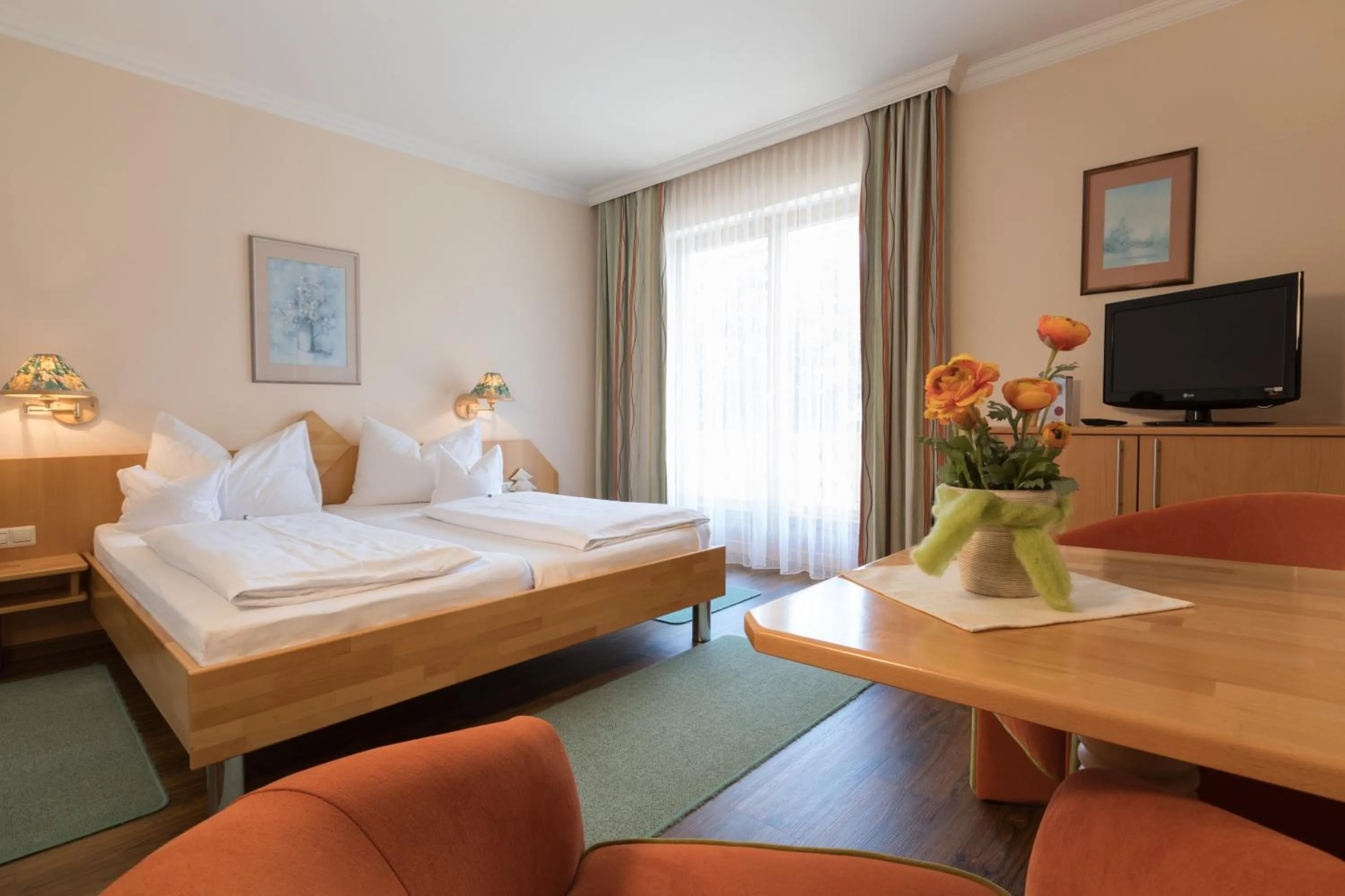 Photo of the whole room, Bed in Landhotel Häuserl im Wald