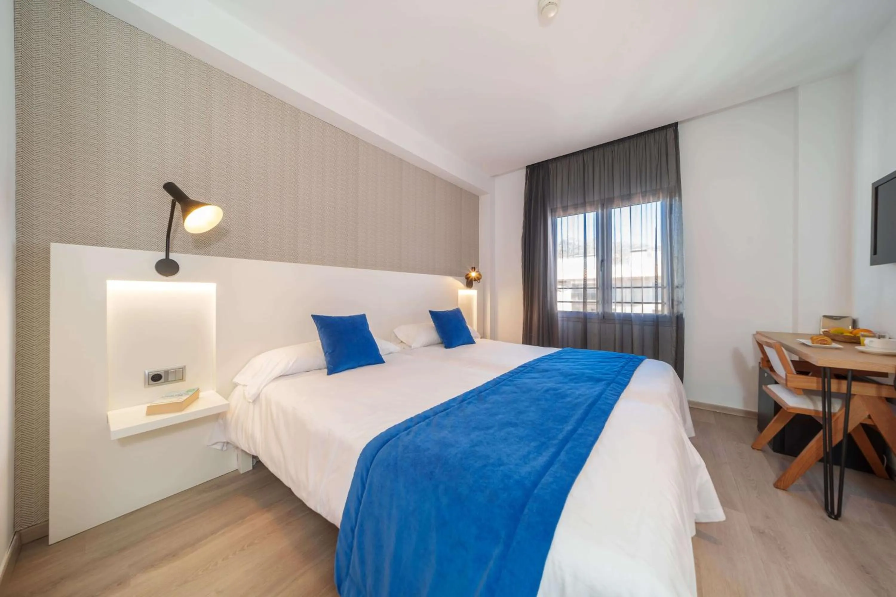 Bed in Mar Calma Hotel