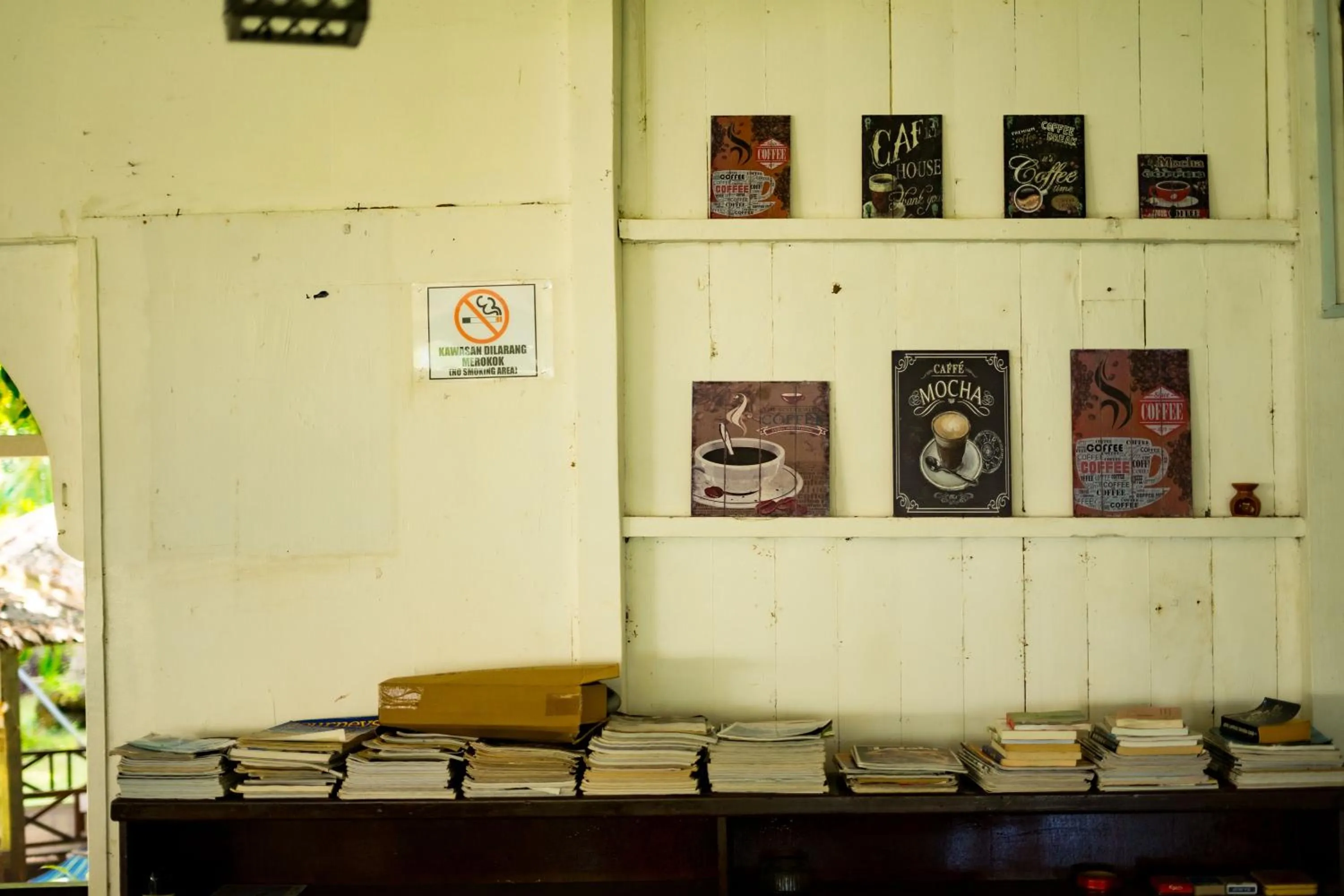 Communal lounge/ TV room in Impian Inn