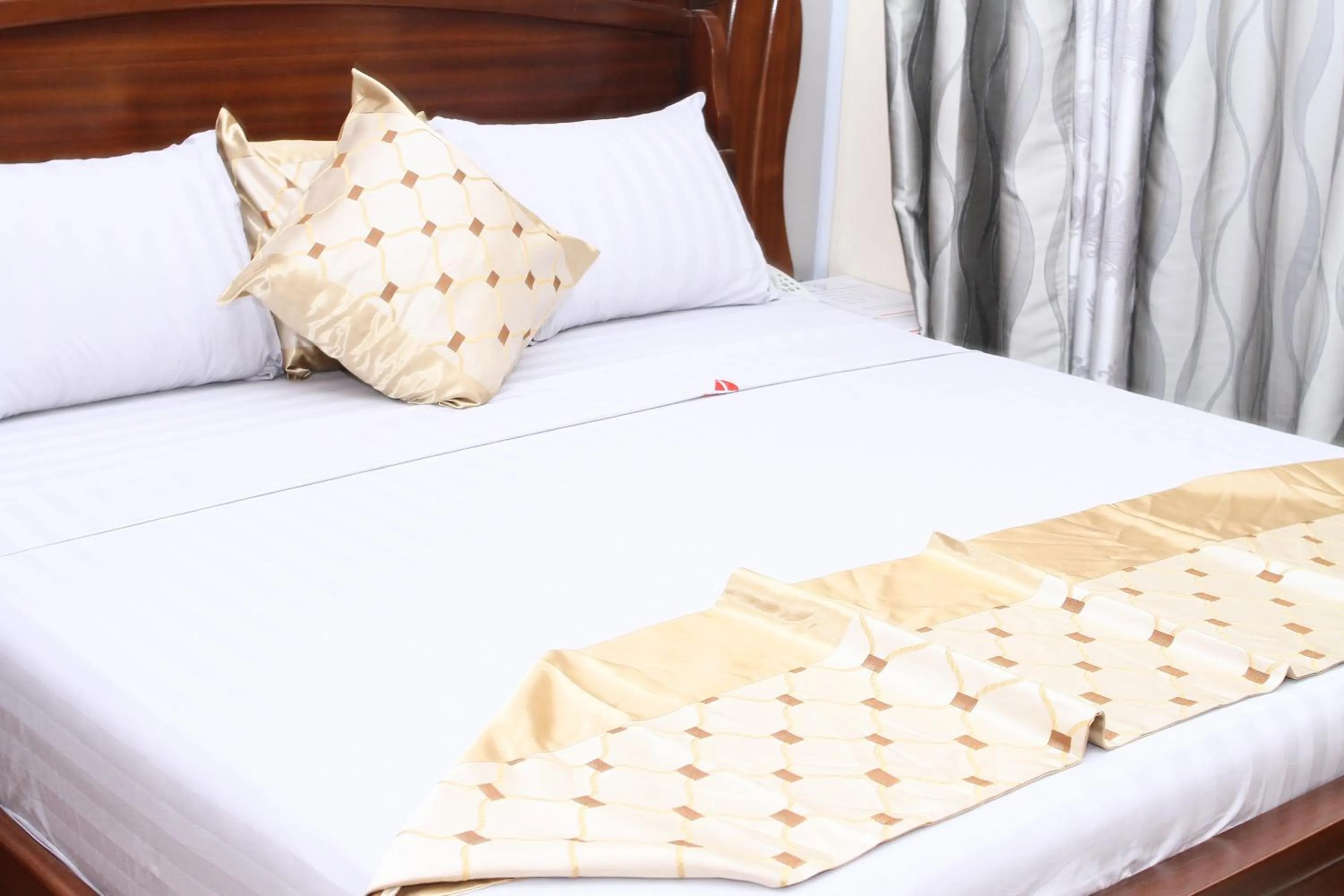 Bed in PLUS 33 HOTEL