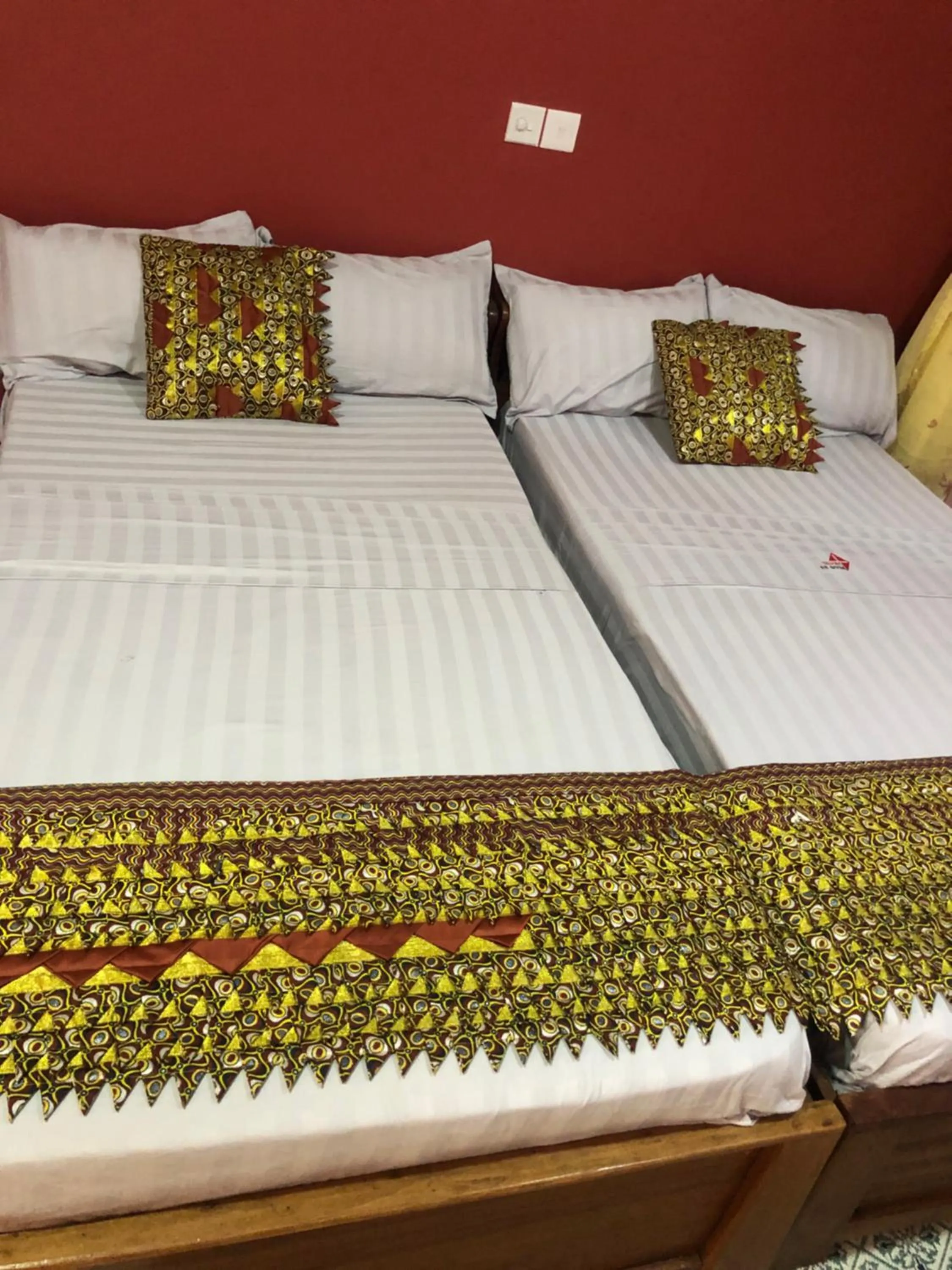 Bed in PLUS 33 HOTEL