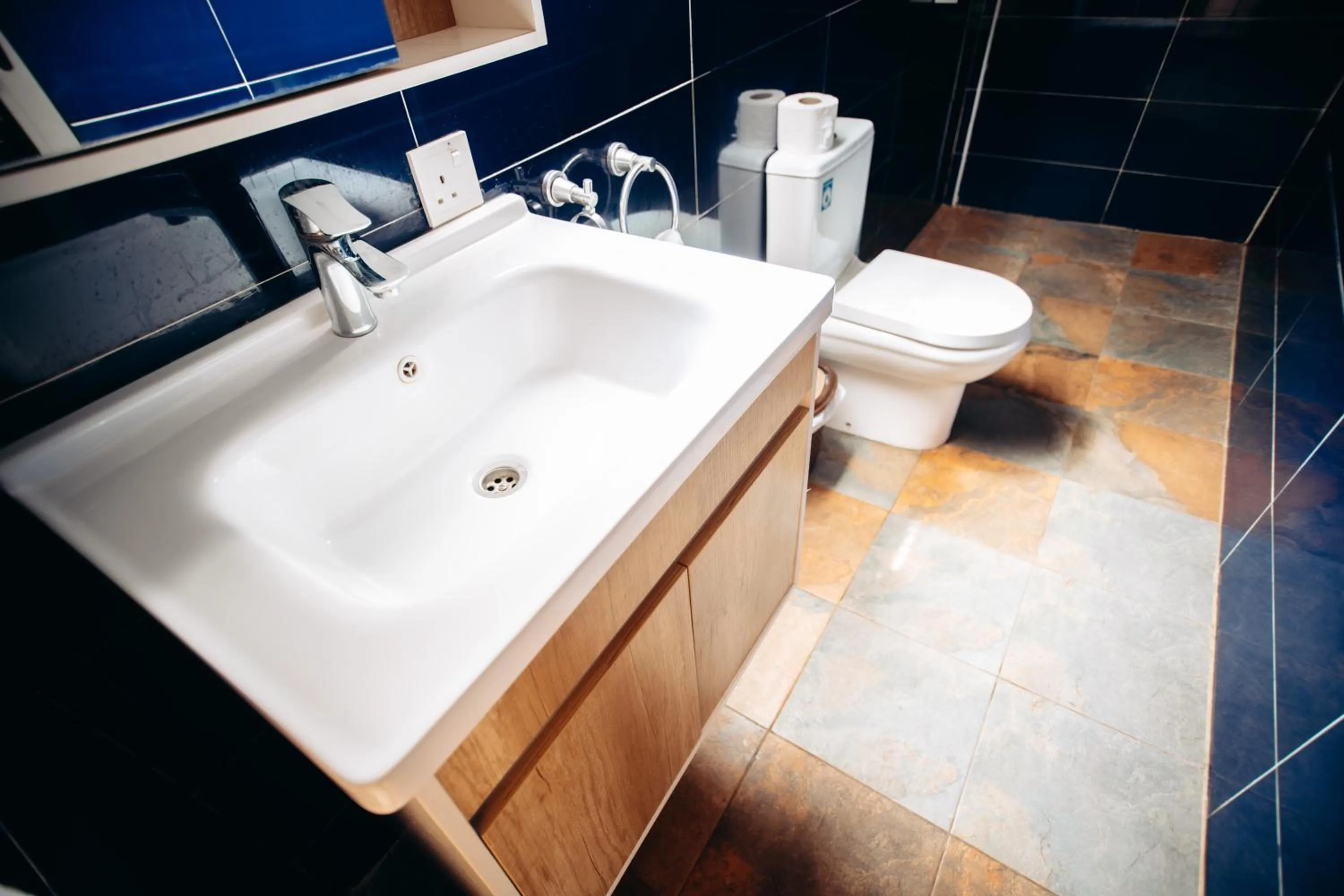 Toilet in PLUS 33 HOTEL