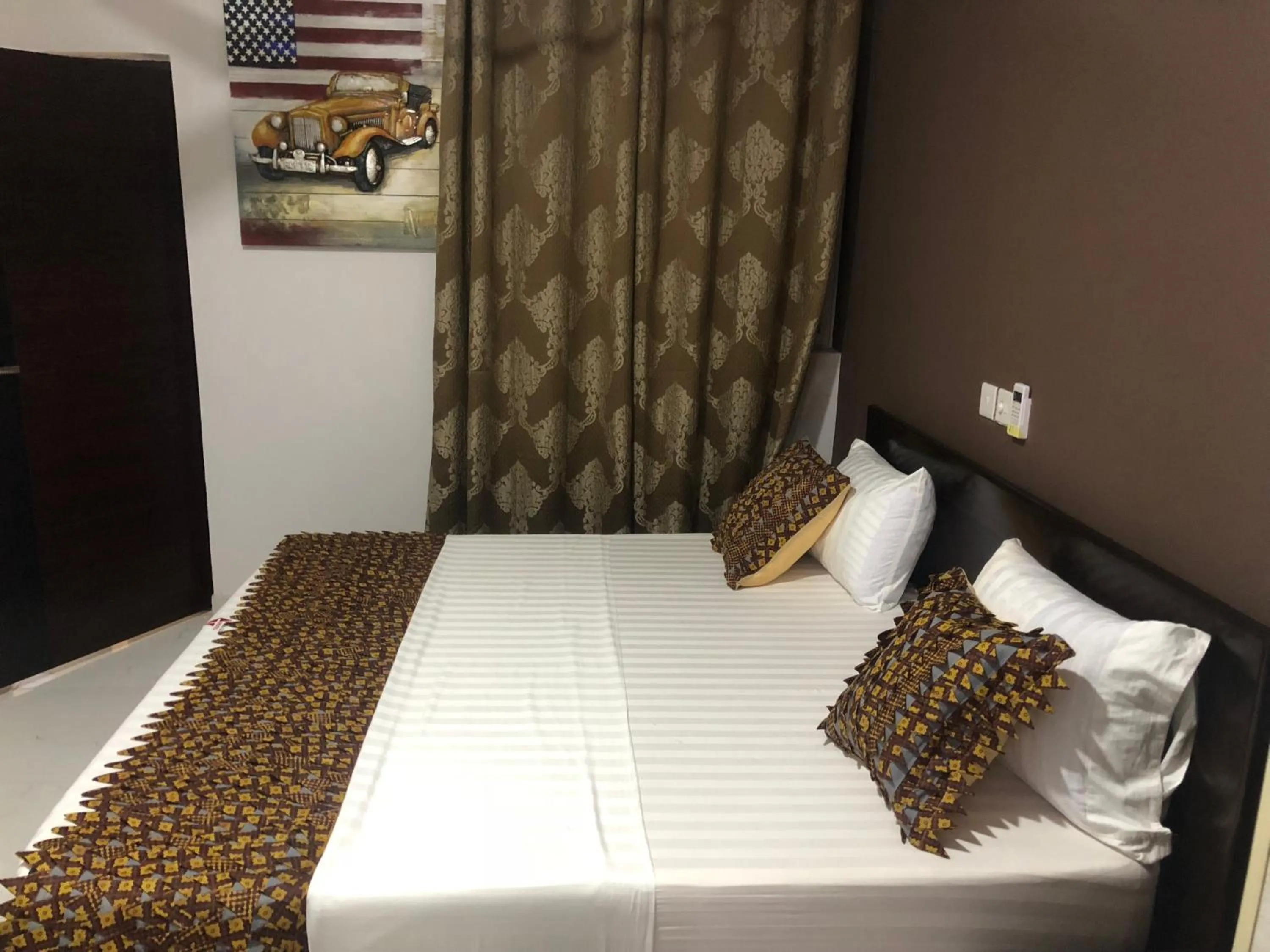 Bed in PLUS 33 HOTEL