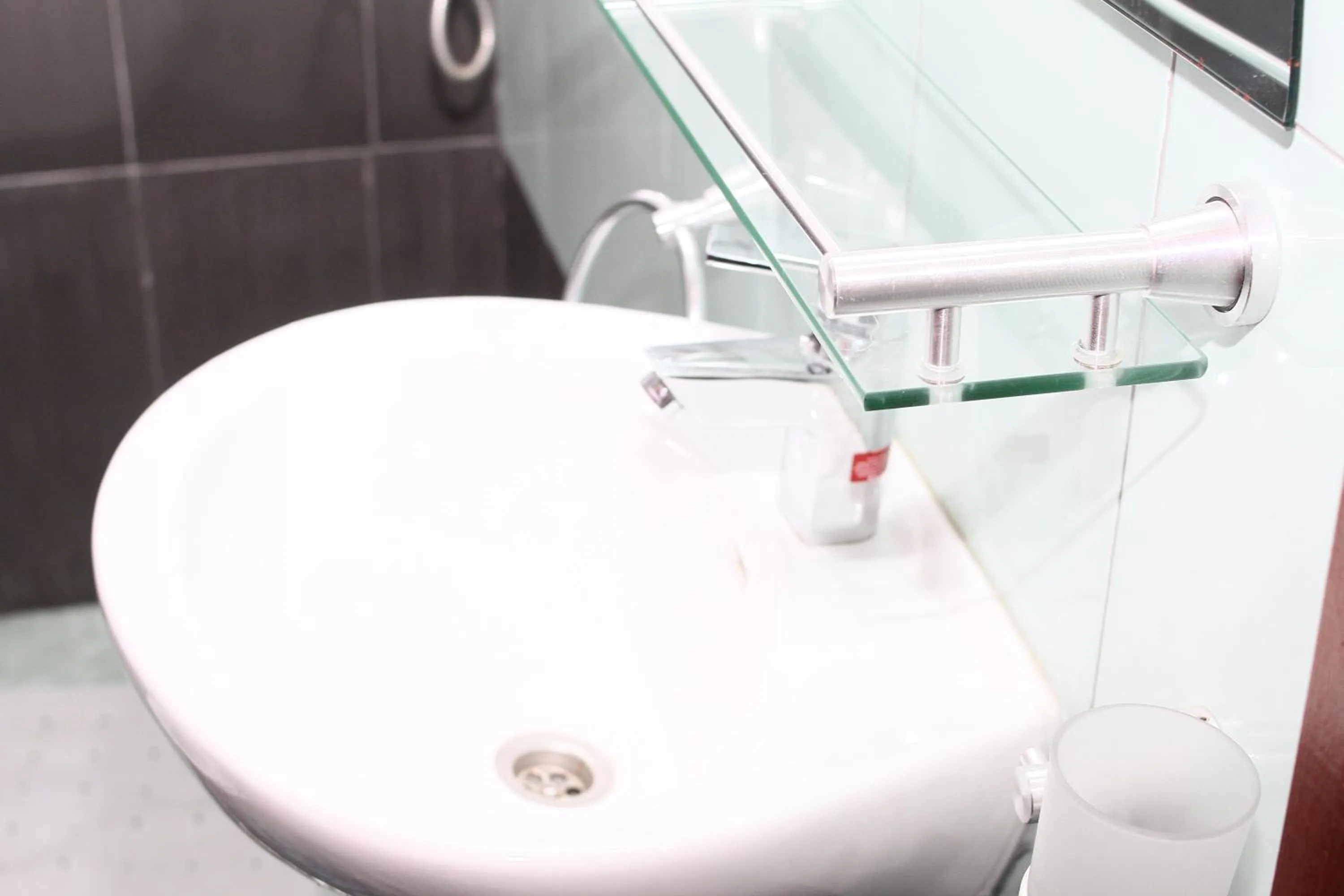 Bathroom in PLUS 33 HOTEL