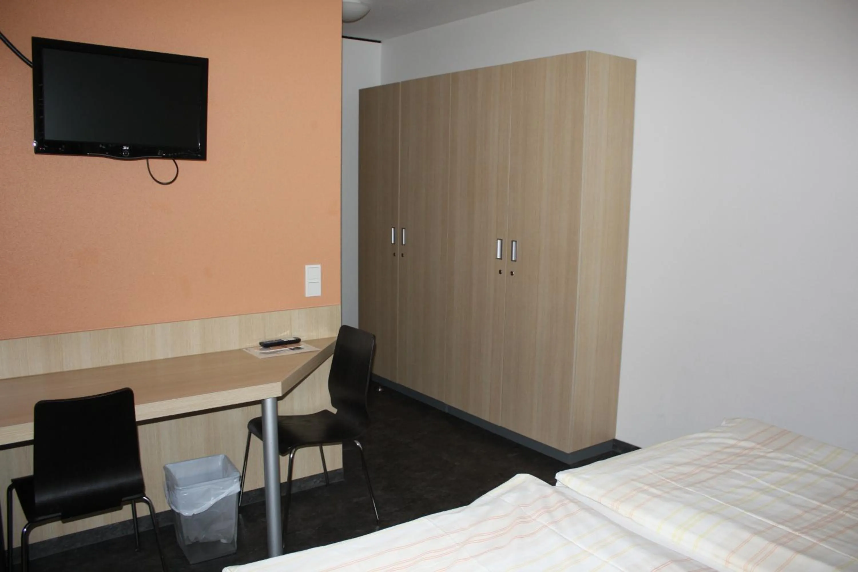 Bed in Hotel Grand Tour