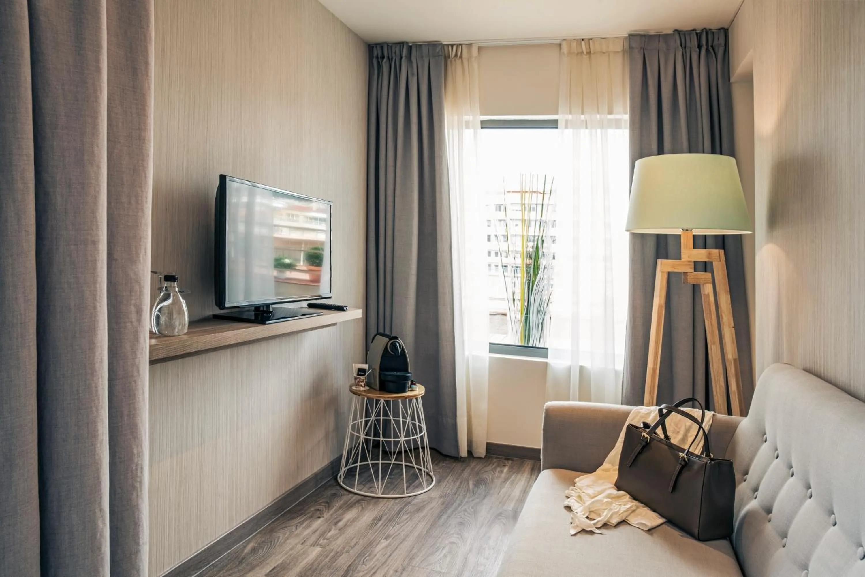 Living room in Mercure Barcelona Condor