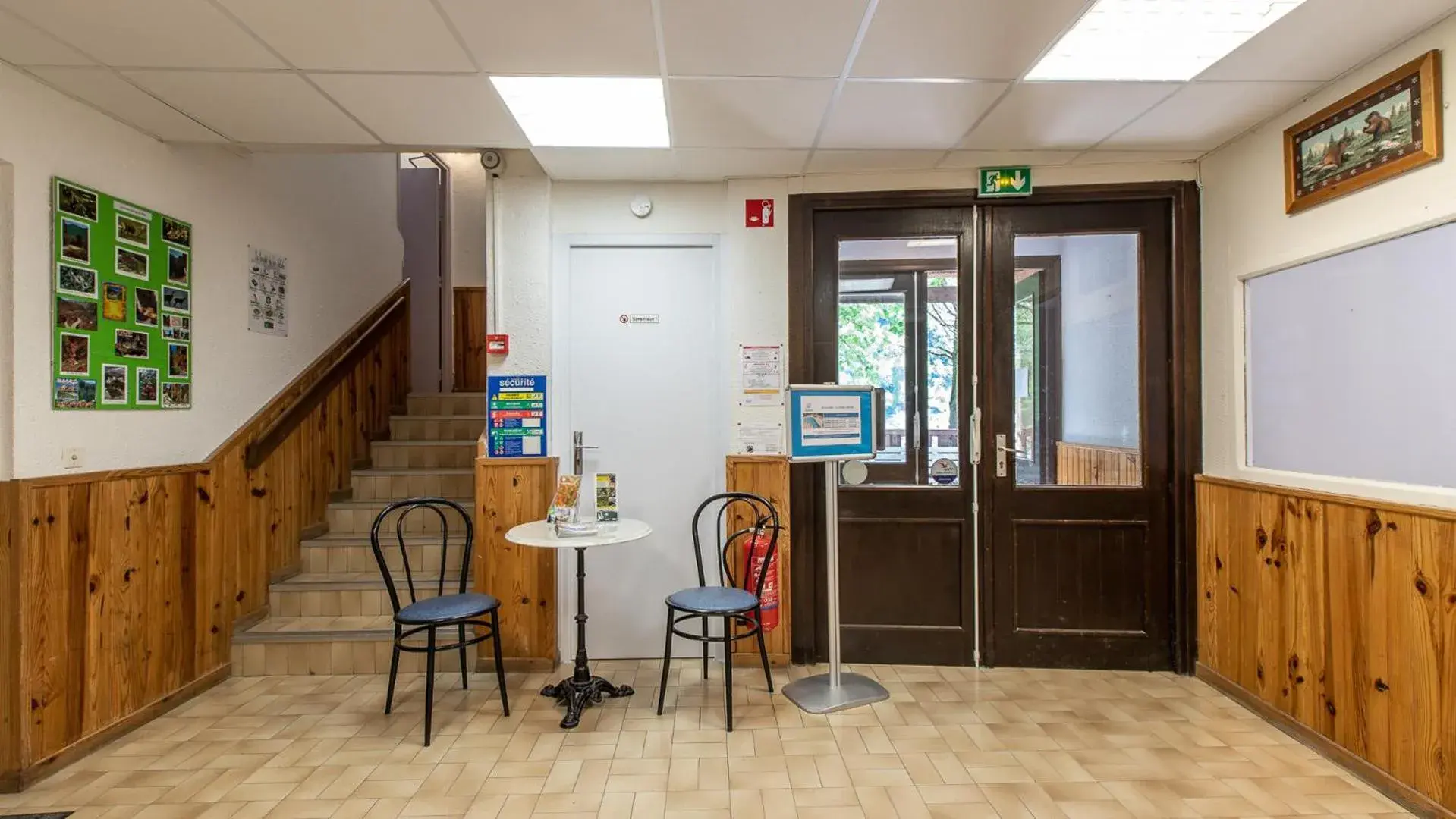 Lobby or reception in Vacancéole - Résidence Les Gorges Rouges Lobby or reception in Vacancéole - Résidence Les Gorges Rouges