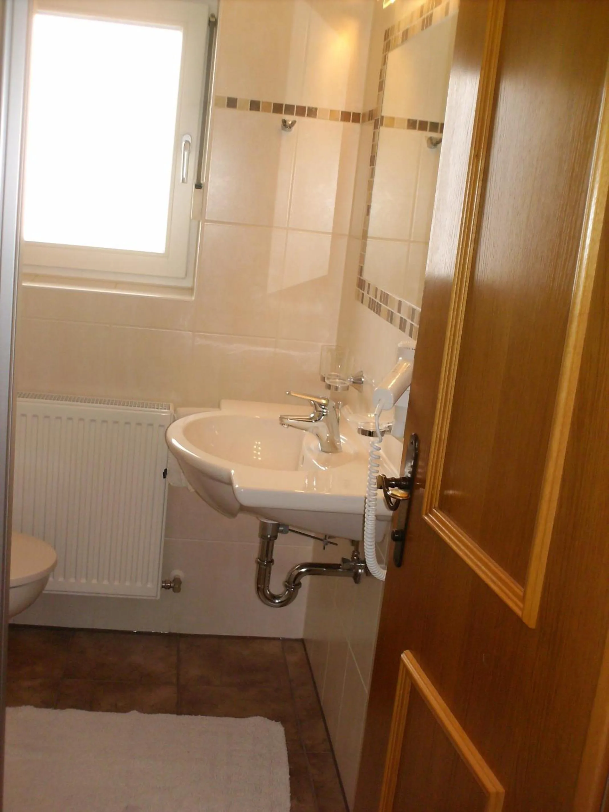 Bathroom in Gästehaus Bergland