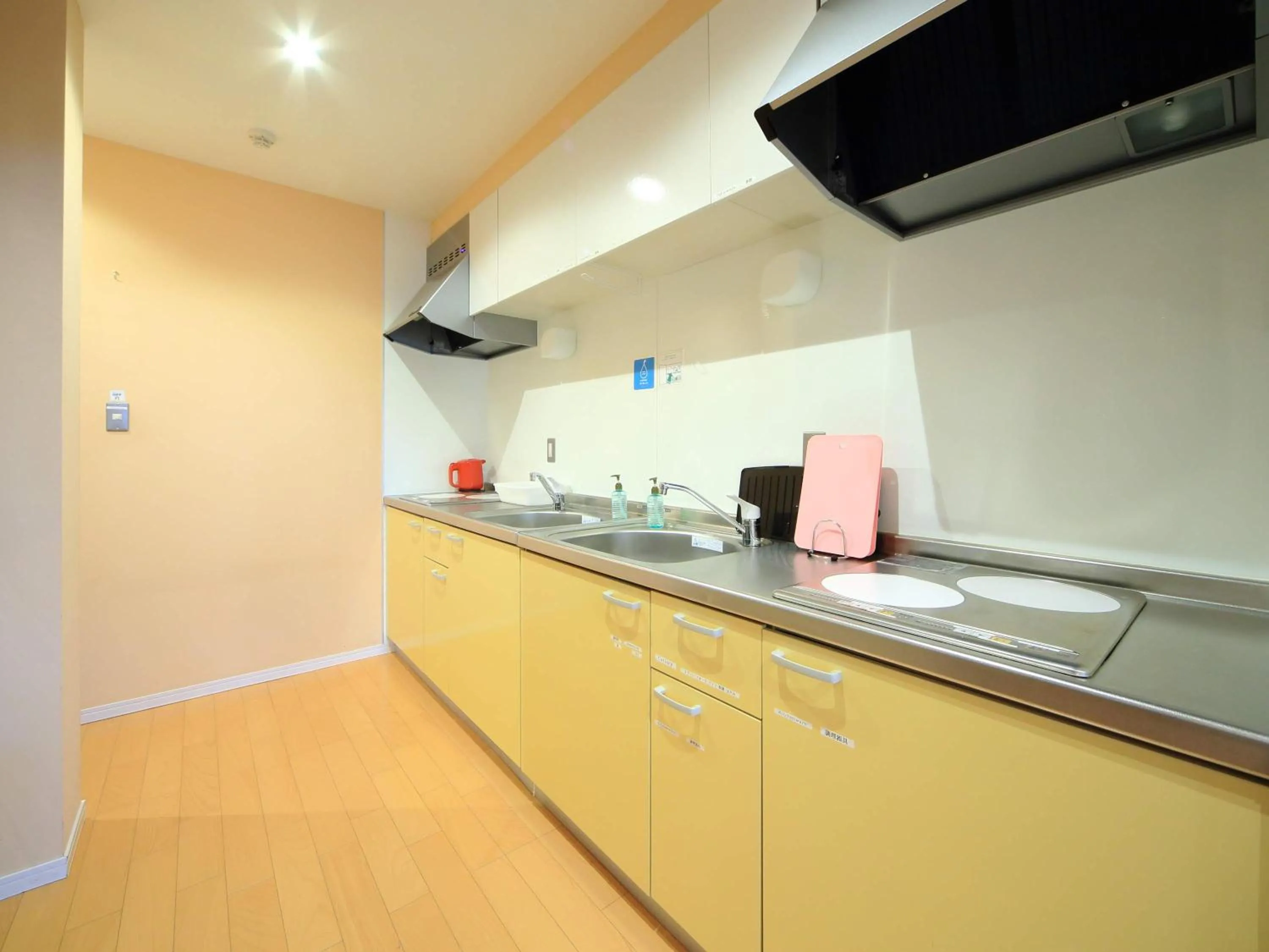 Kitchen or kitchenette in コージーイン 東京桜新町