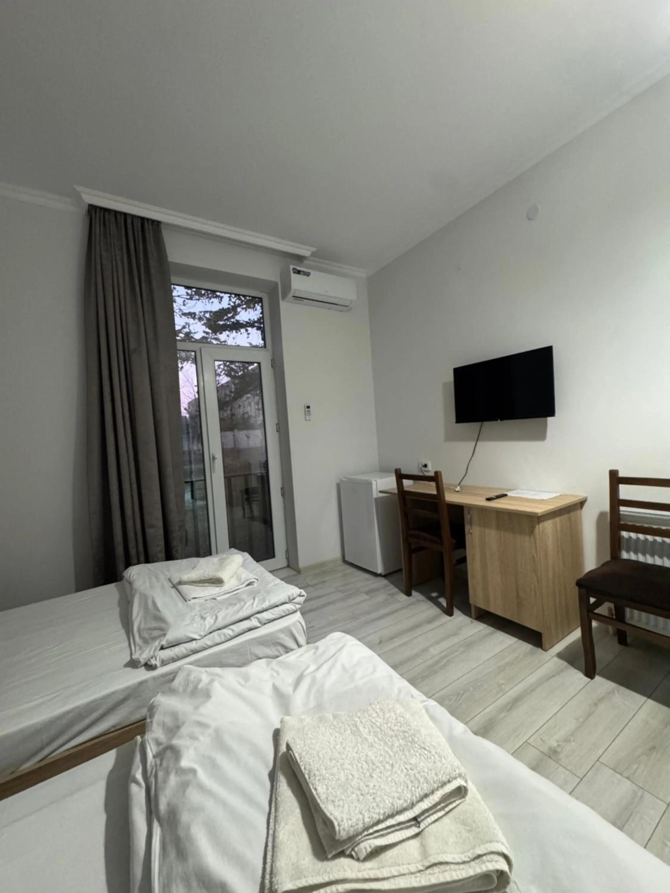 Communal lounge/ TV room, Bed in Hotel Giorgi