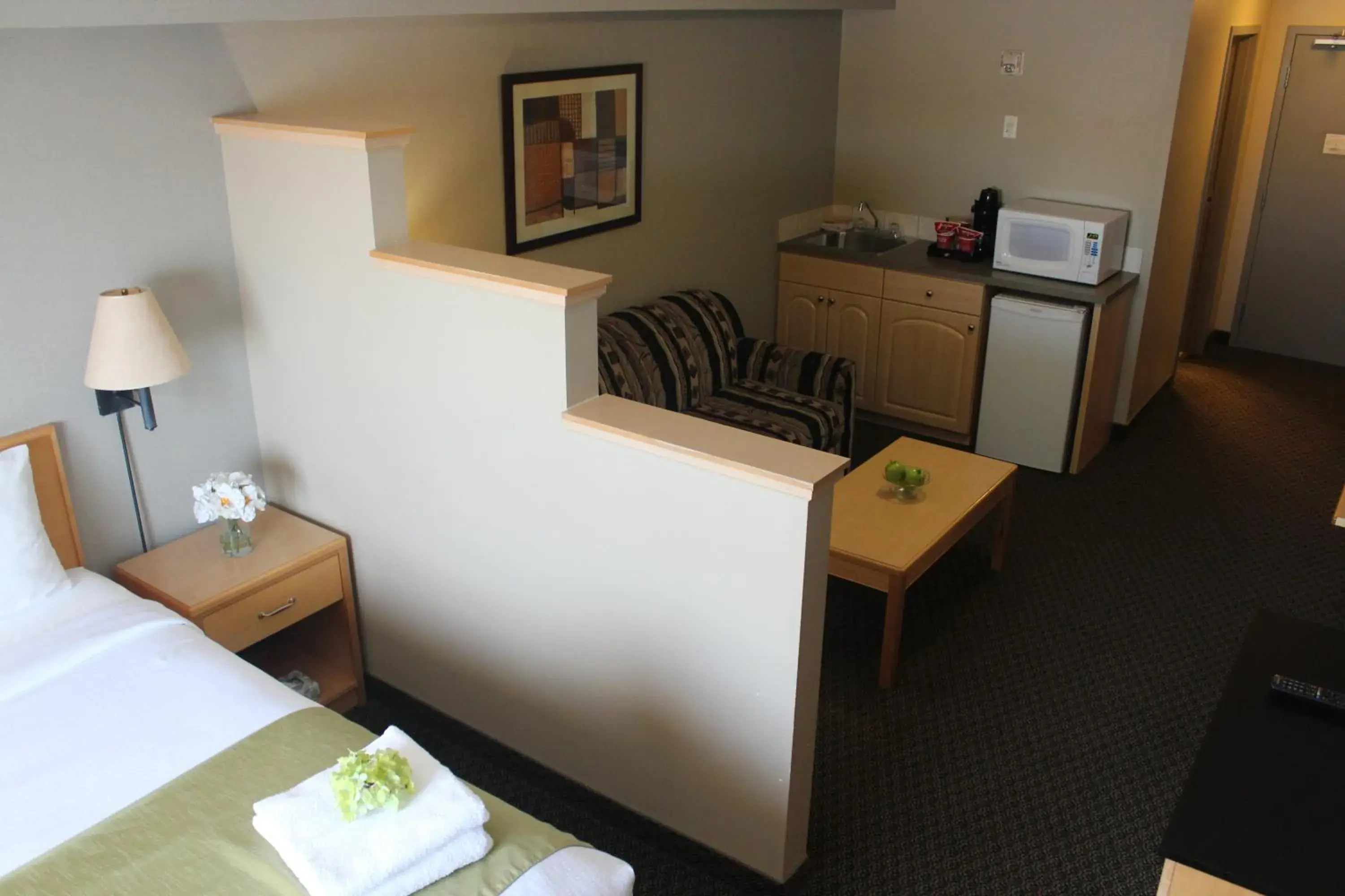 Extended Stay Room with Kitchenette in Travelodge by Wyndham Fort McMurray Extended Stay Room with Kitchenette in Travelodge by Wyndham Fort McMurray