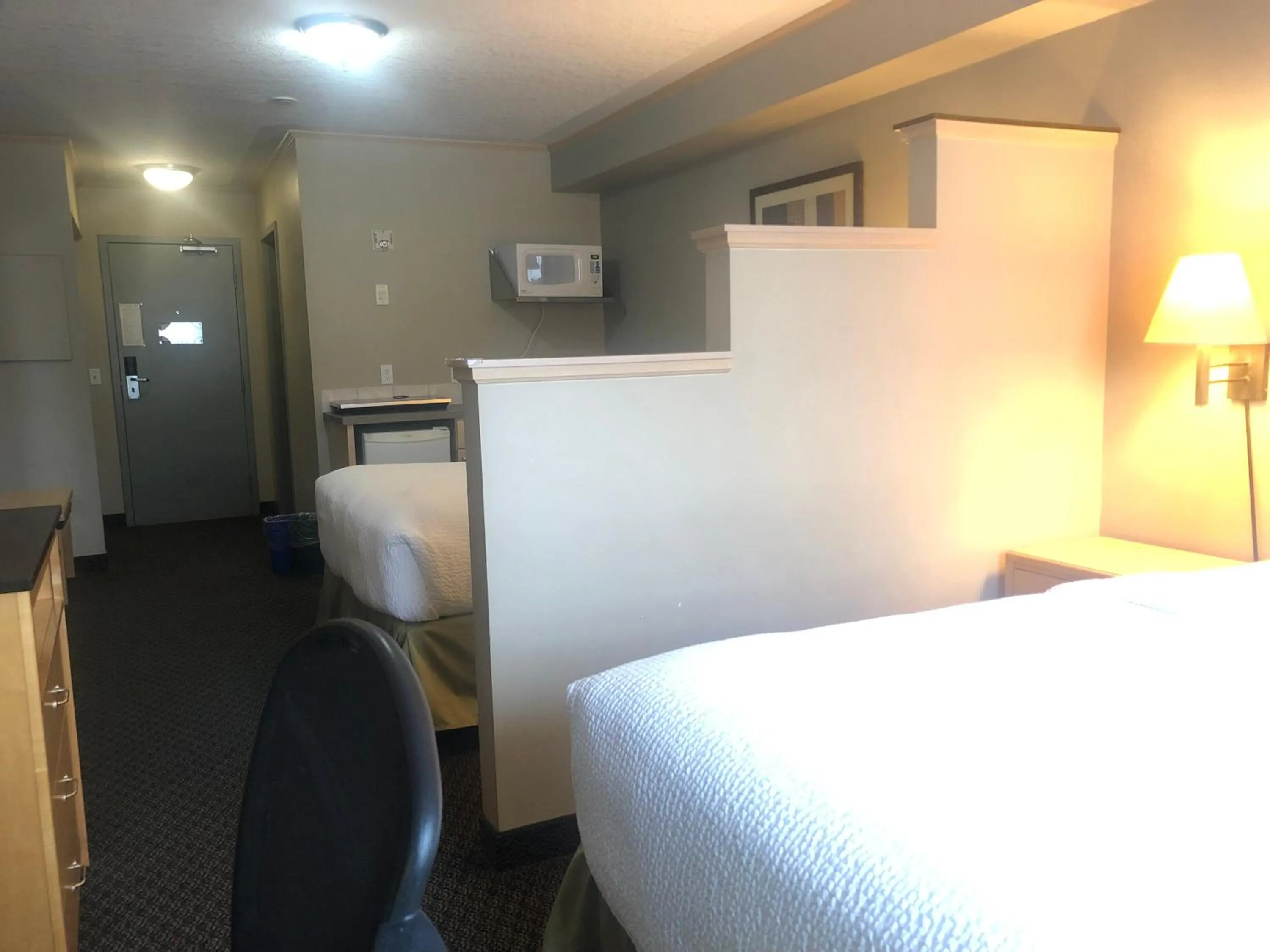 Photo of the whole room, Bed in Travelodge by Wyndham Fort McMurray