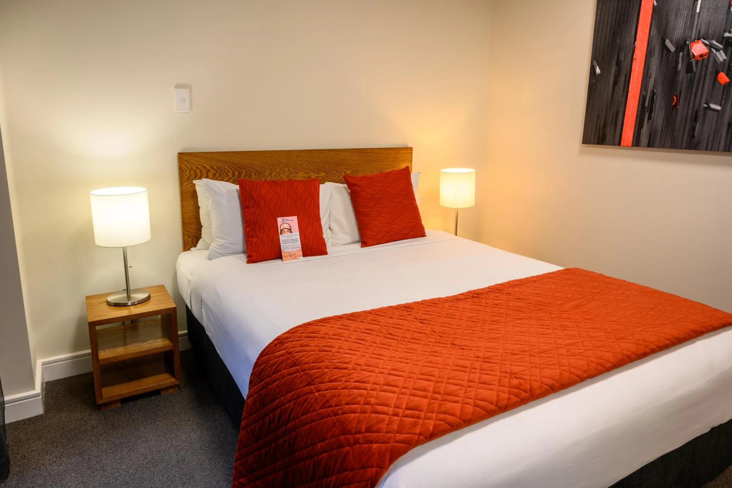 Bed in Boulcott Suites