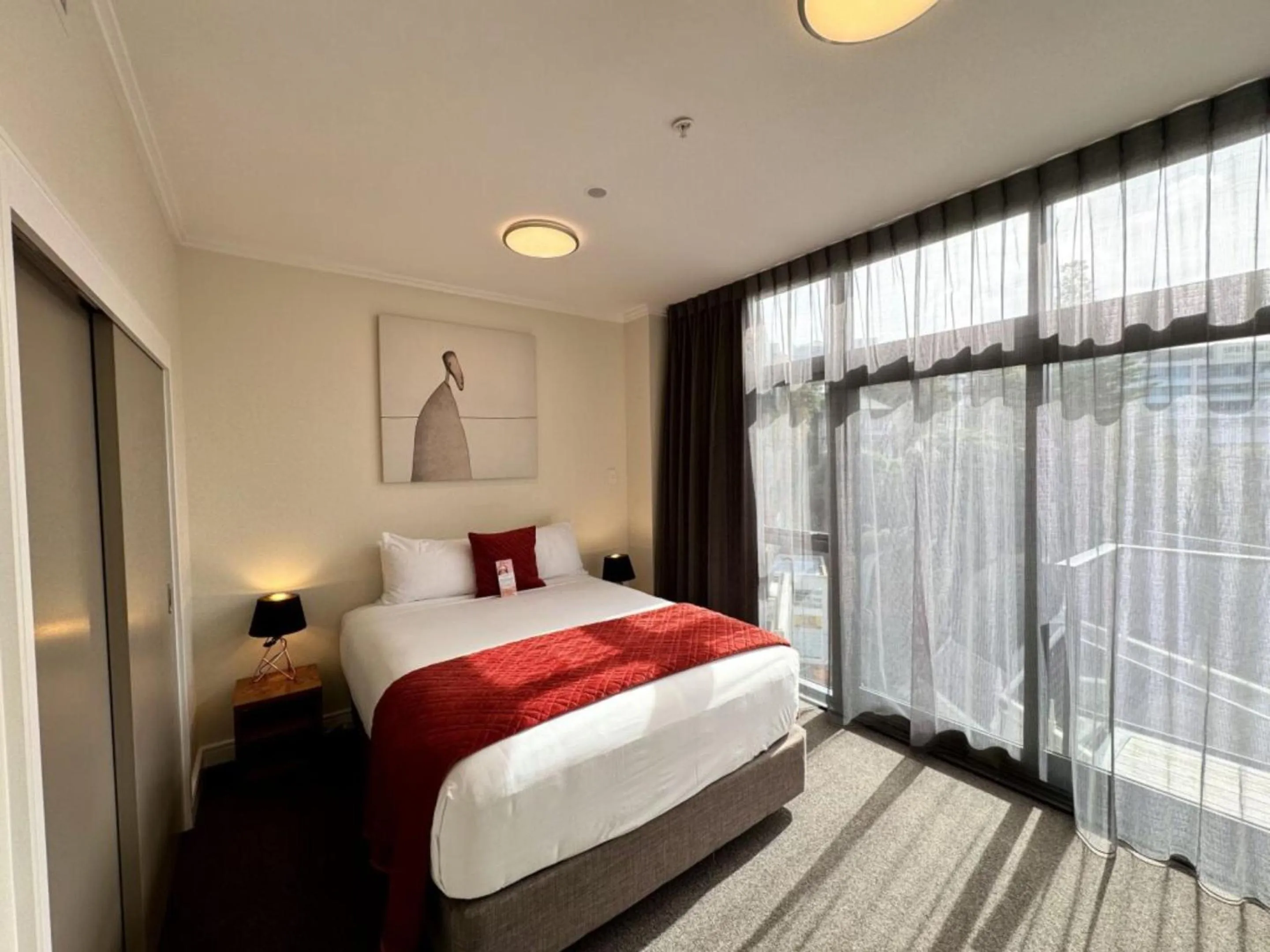 Bed in Boulcott Suites