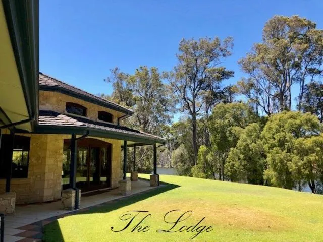 Property building in Harmony Forest Cottages & Lake side Lodge