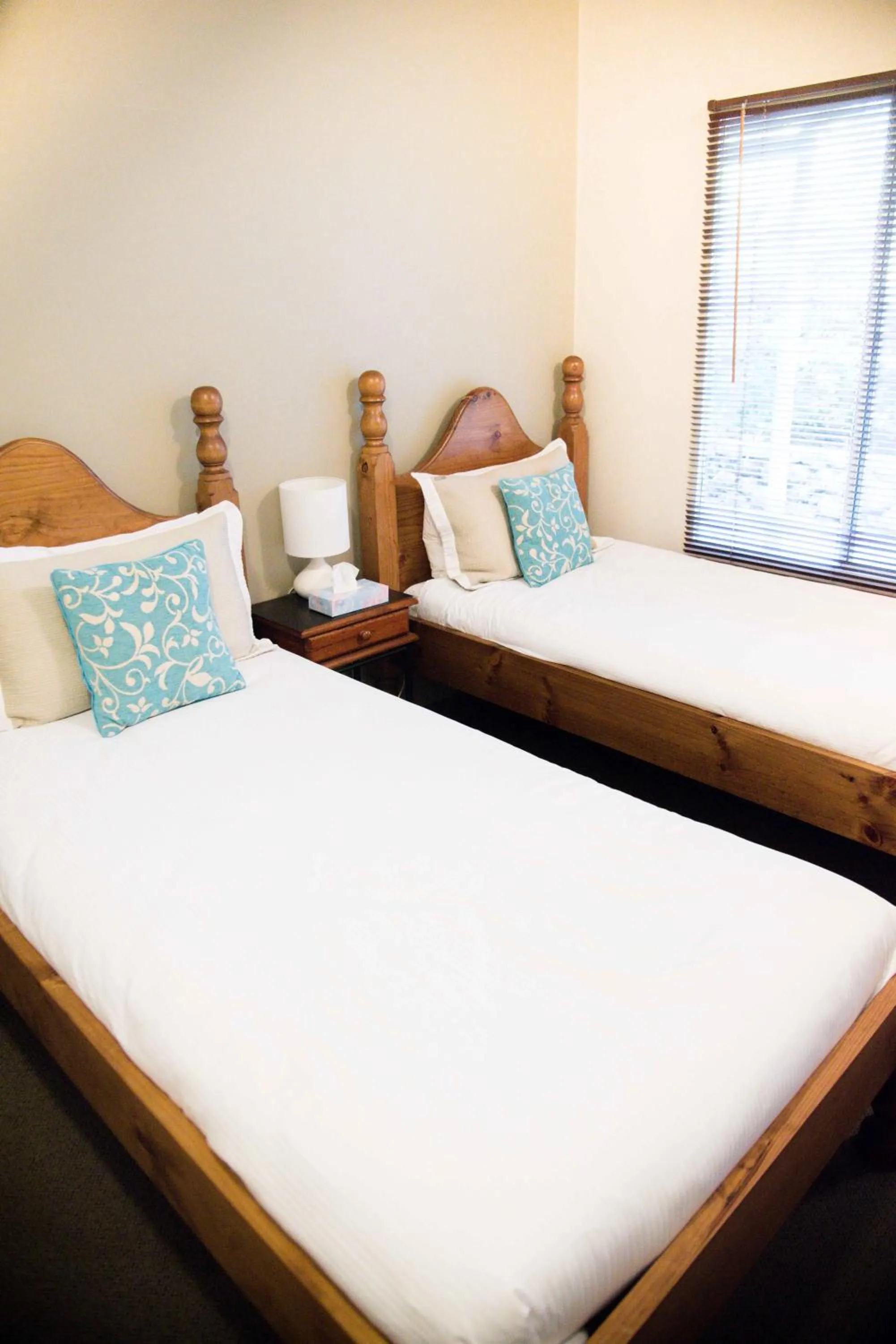 Bed in Harmony Forest Cottages & Lake side Lodge