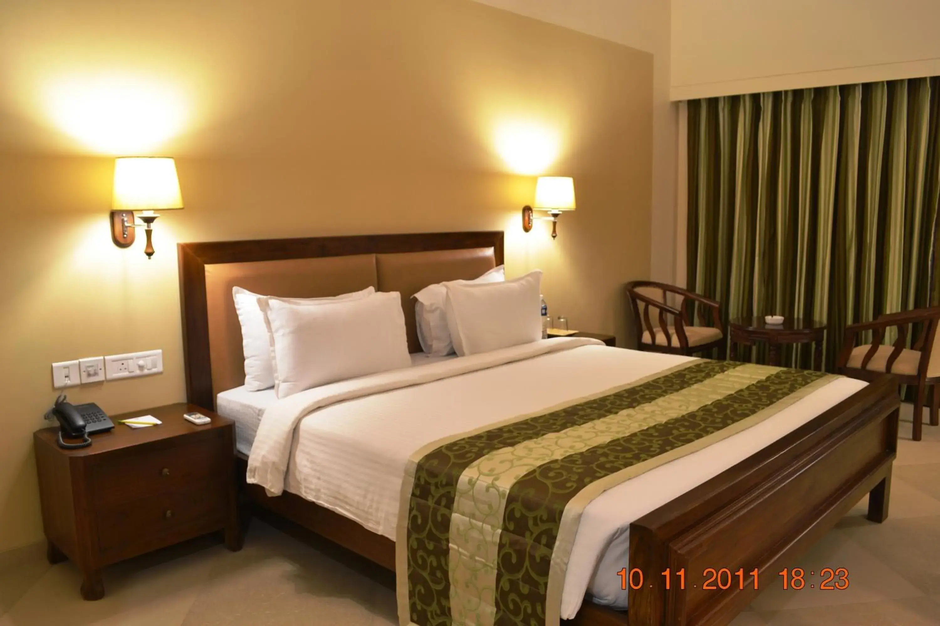 Bed in Uday Suites - The Airport Hotel Bed in Uday Suites - The Airport Hotel