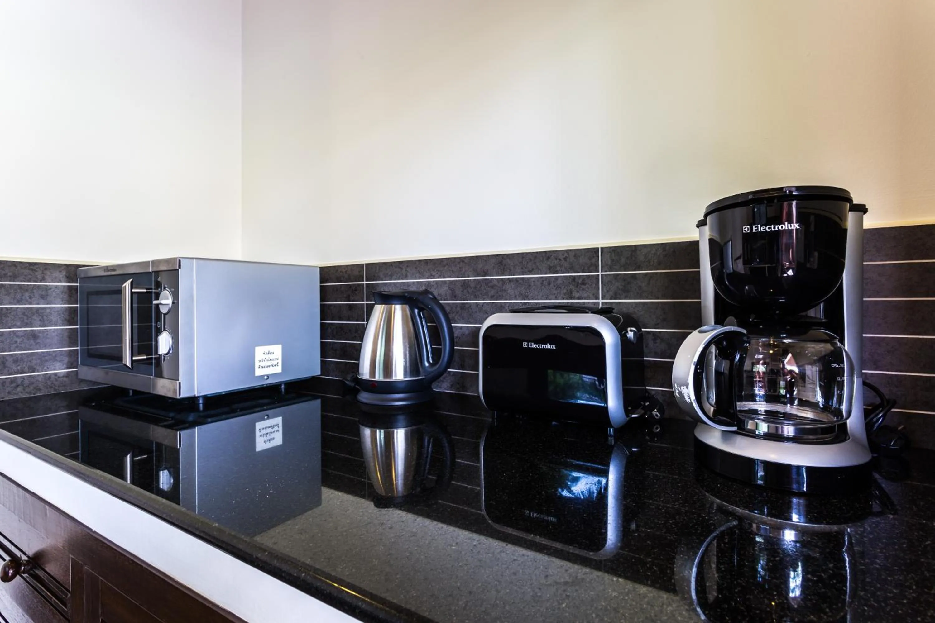 Kitchen or kitchenette in Phuket Pool Residence - Adults only