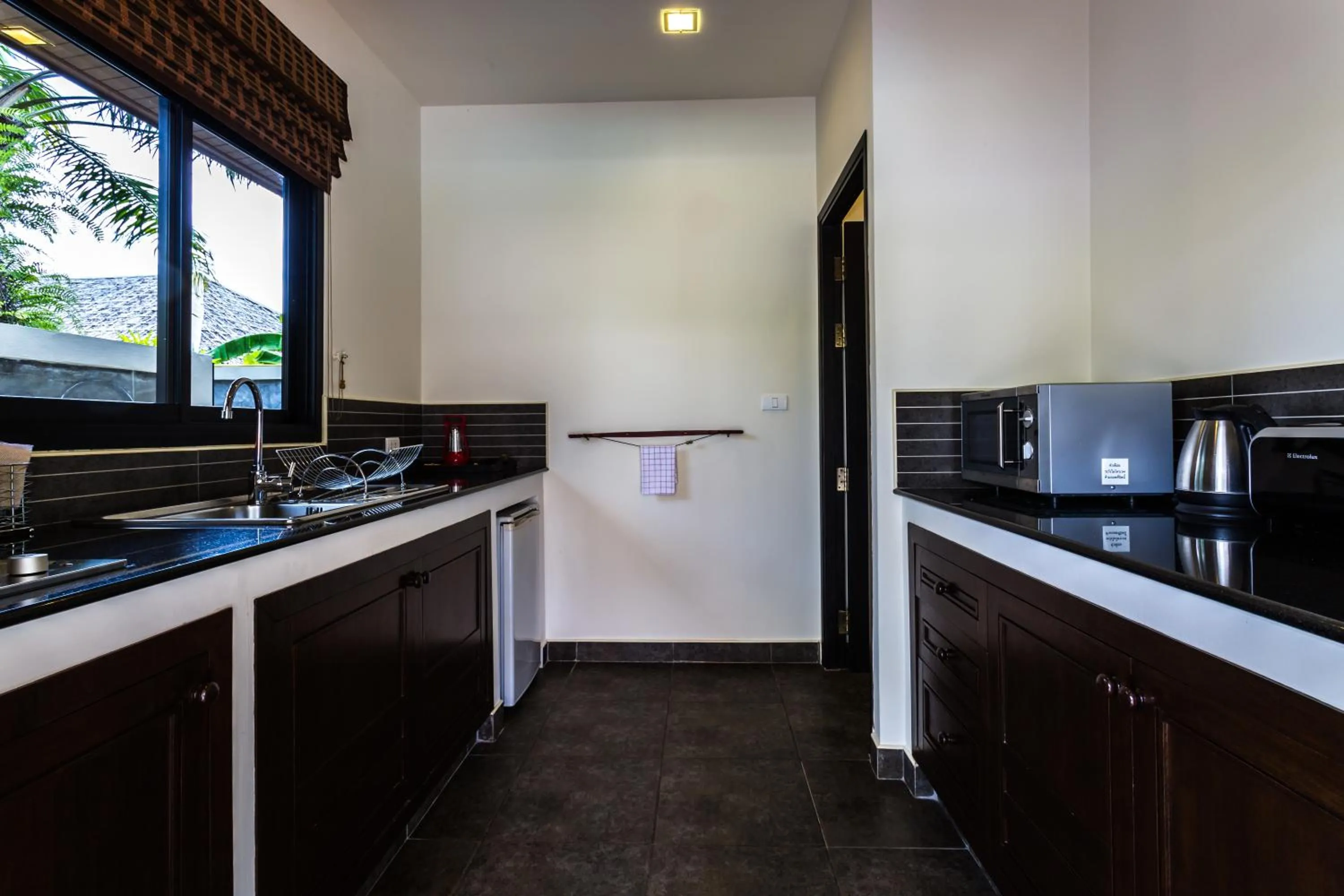 Kitchen or kitchenette in Phuket Pool Residence - Adults only