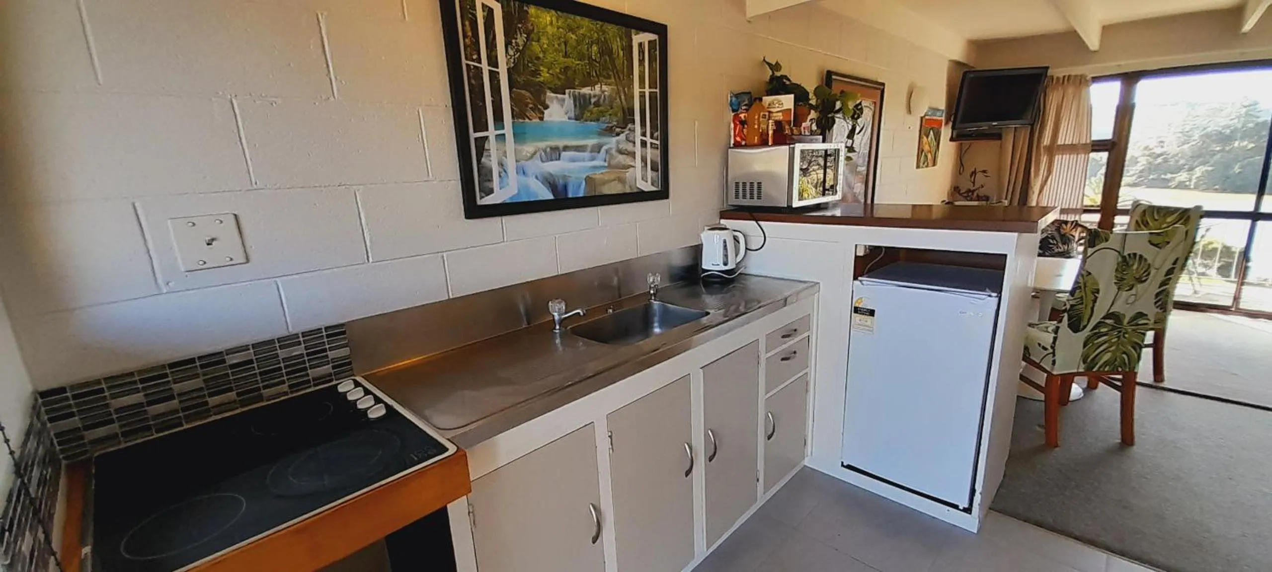 Kitchen or kitchenette in Waterfalls Estate - Motel & Campground