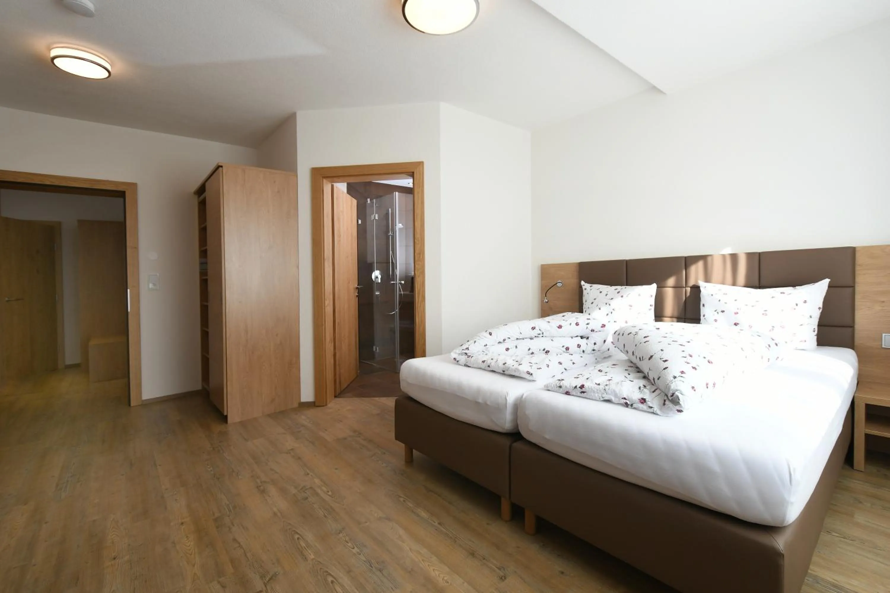 Bed in Ferienwohnungen Marmot