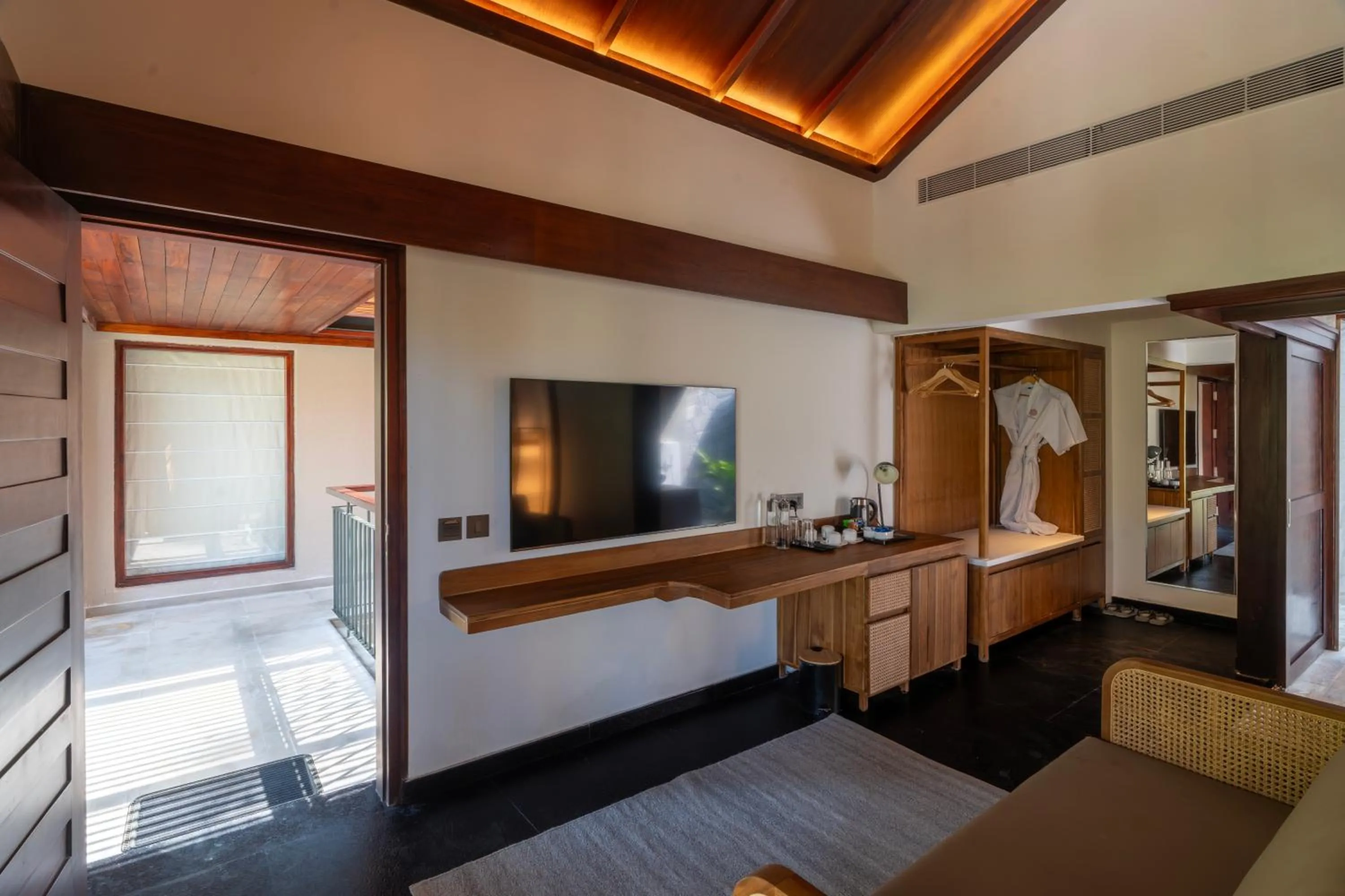 Communal lounge/ TV room in Ayatana Coorg