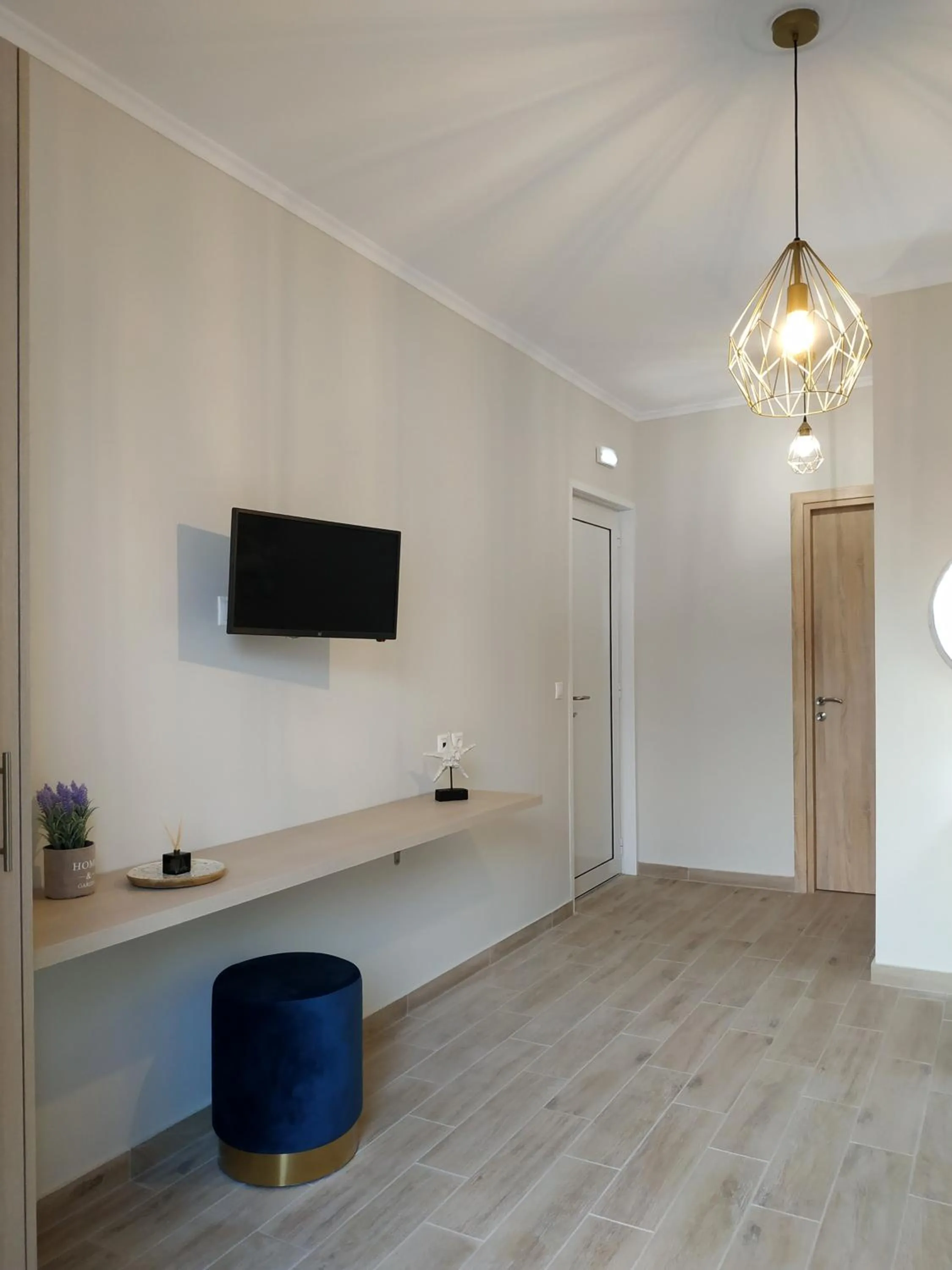 Communal lounge/ TV room in Lilly Apartments