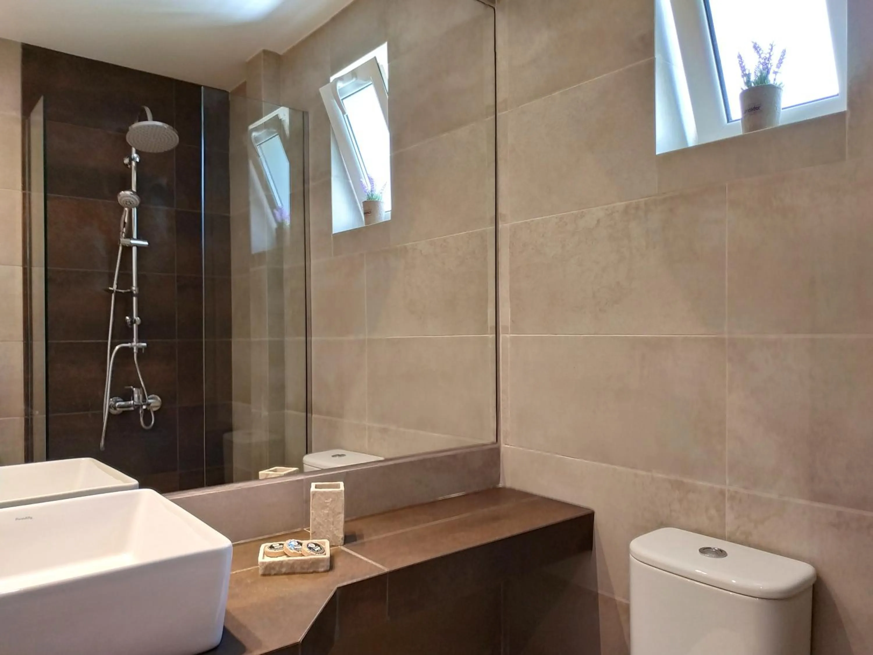 Toilet in Lilly Apartments