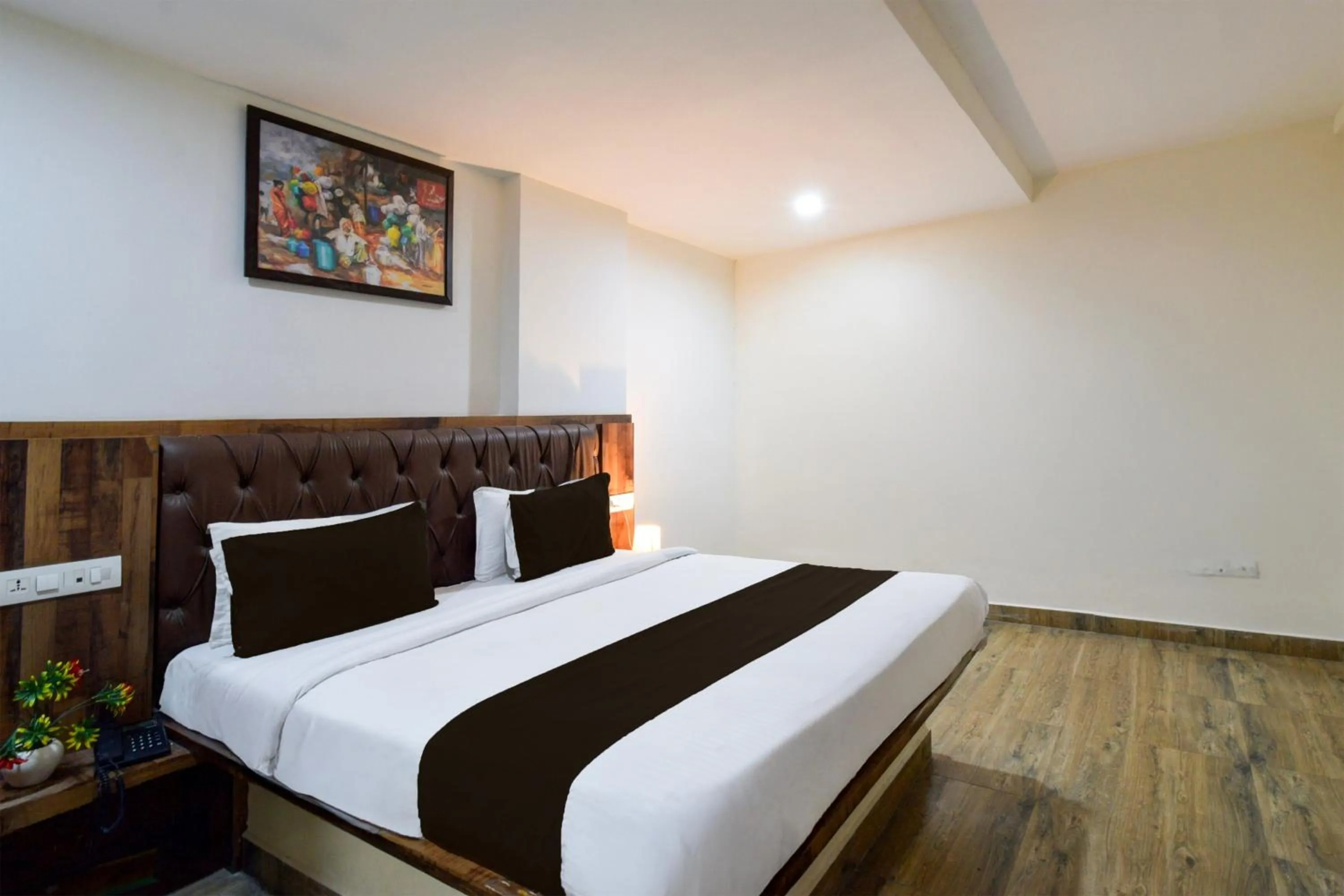 Bedroom, Bed in Super Townhouse Vanasthalipuram Formerly Hotel Surabhi