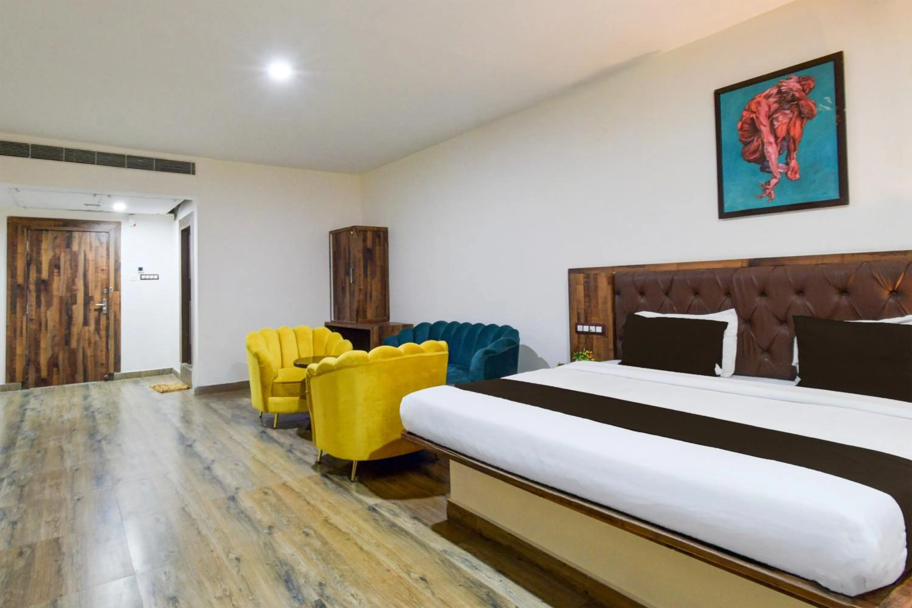 Bedroom, Bed in Super Townhouse Vanasthalipuram Formerly Hotel Surabhi