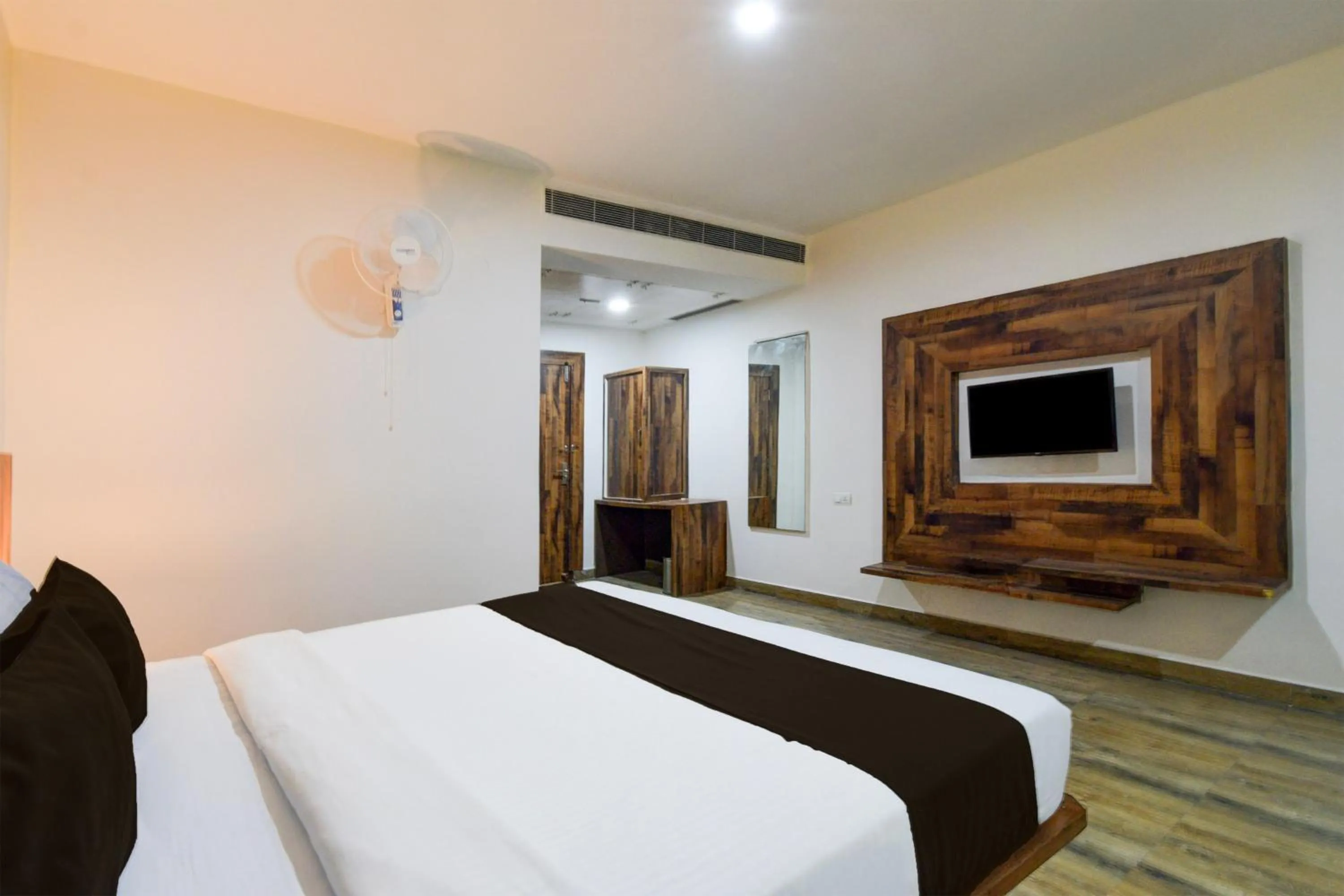 Bedroom, Bed in Super Townhouse Vanasthalipuram Formerly Hotel Surabhi
