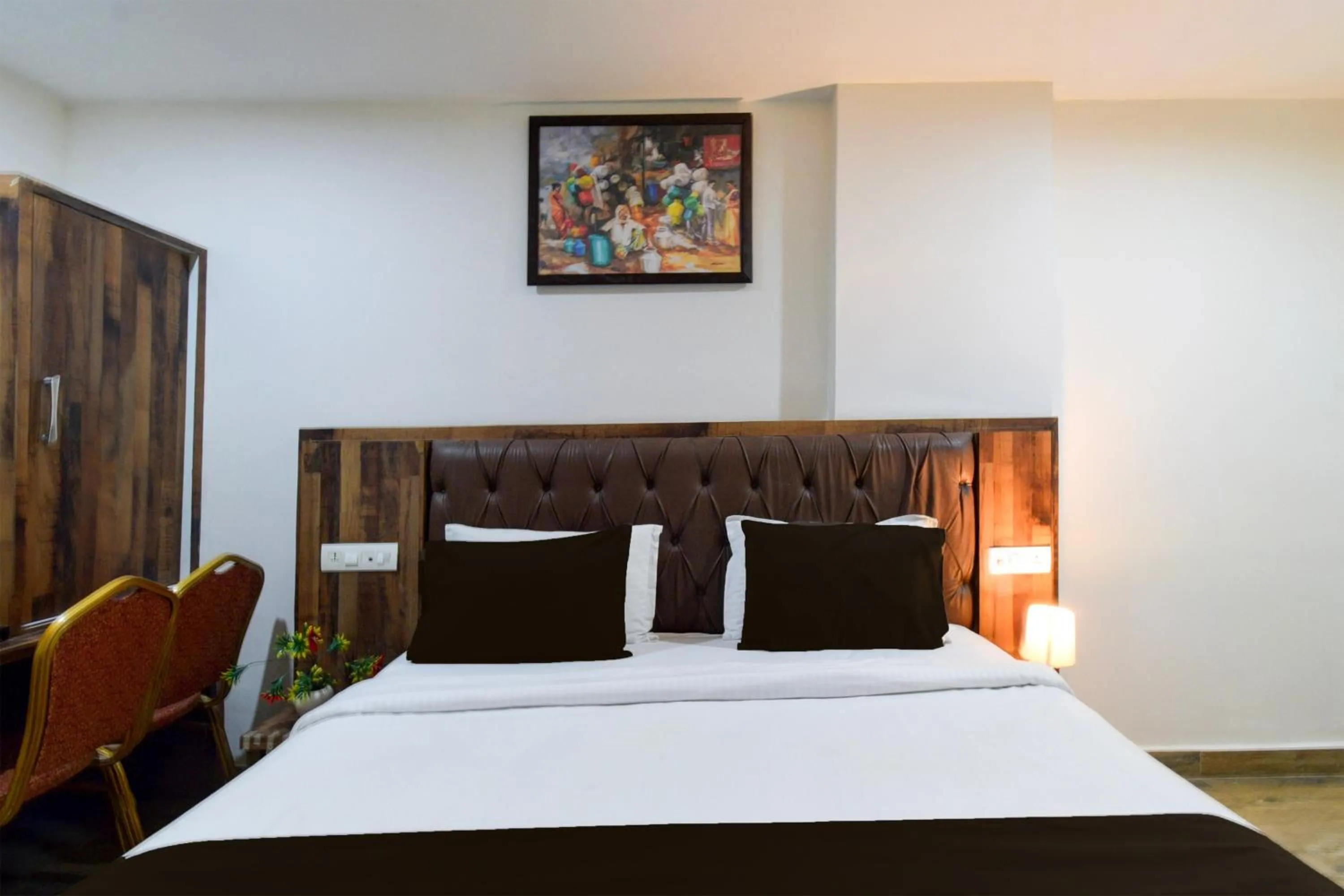 Bedroom, Bed in Super Townhouse Vanasthalipuram Formerly Hotel Surabhi