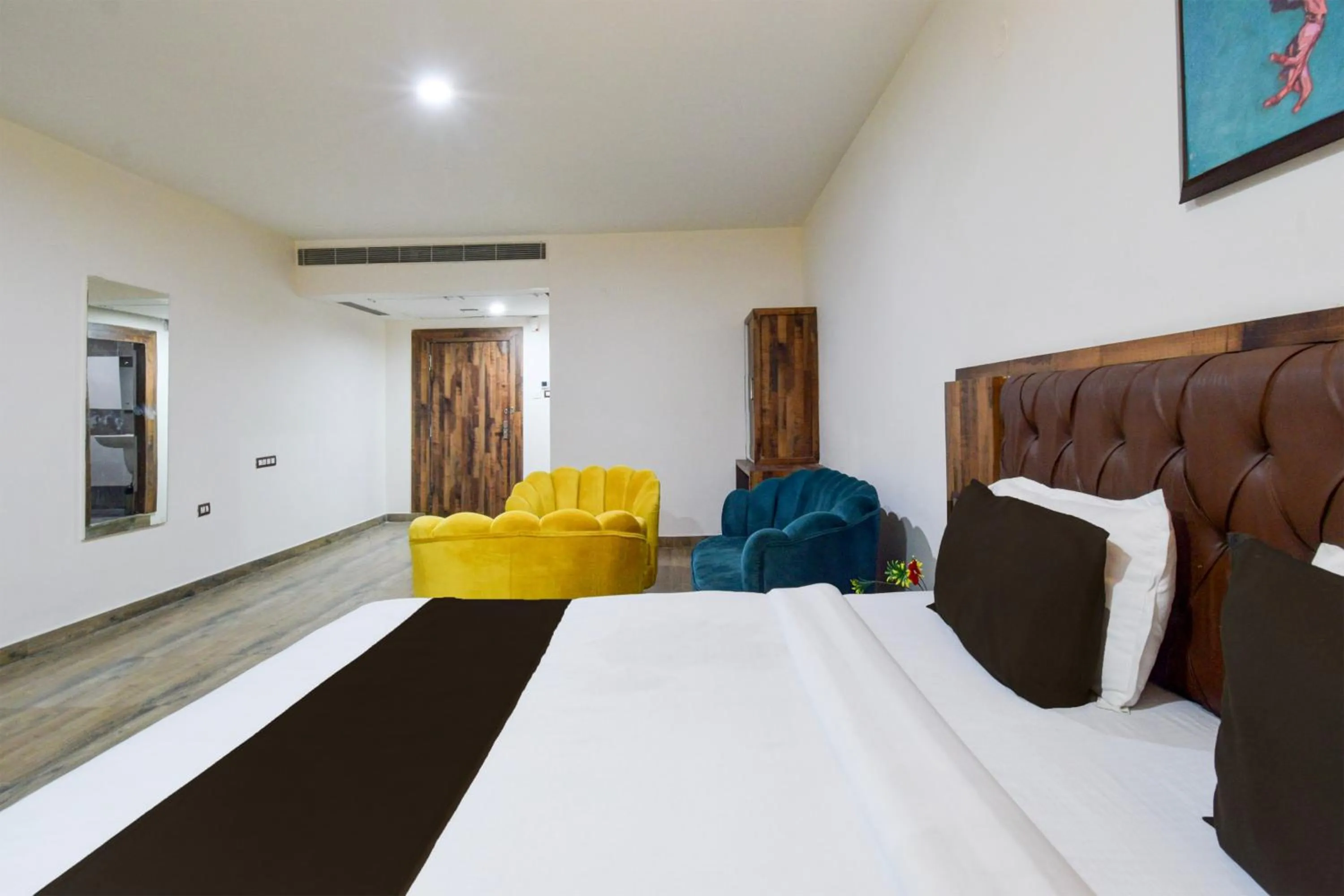 Bedroom, Bed in Super Townhouse Vanasthalipuram Formerly Hotel Surabhi