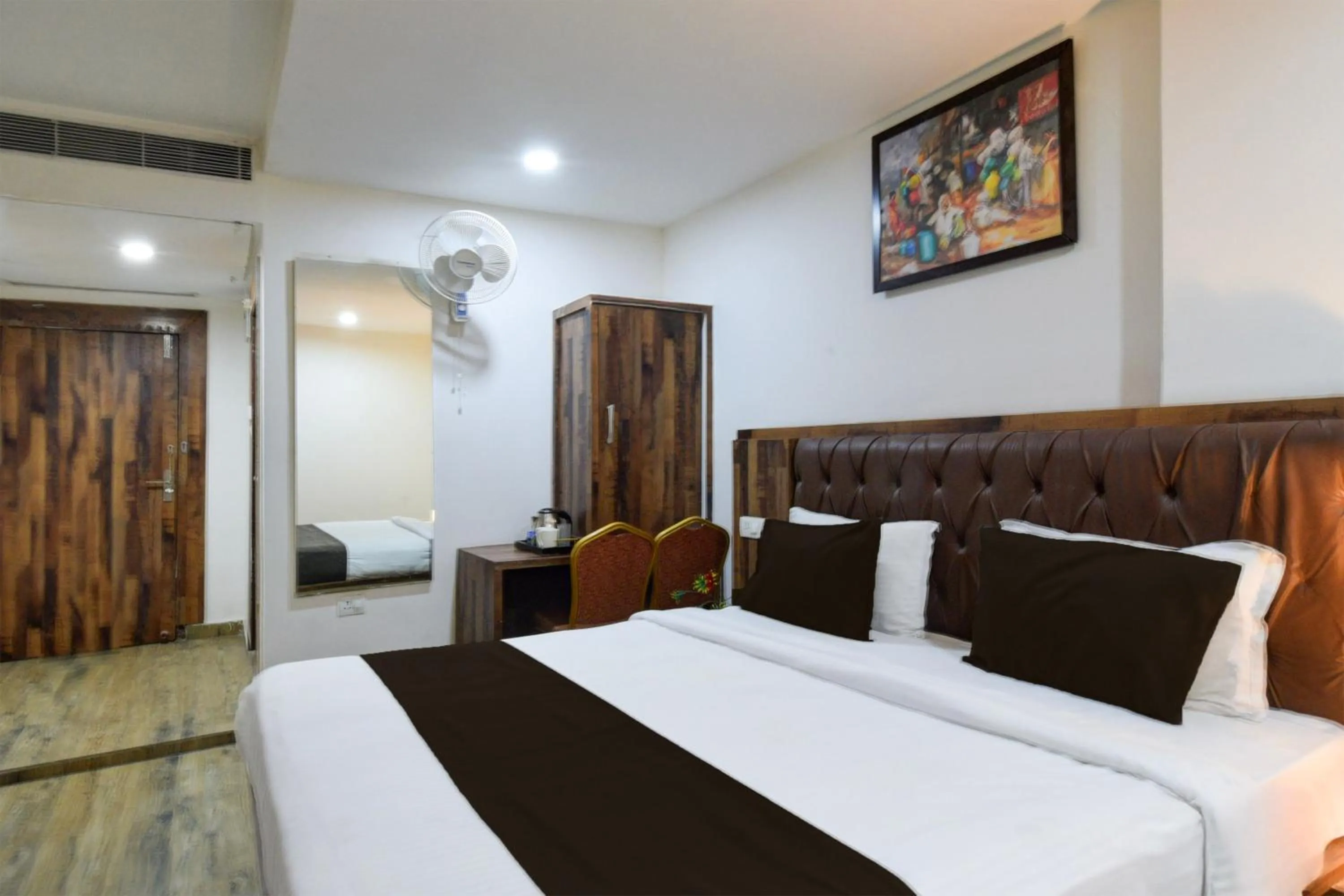 Bedroom, Bed in Super Townhouse Vanasthalipuram Formerly Hotel Surabhi