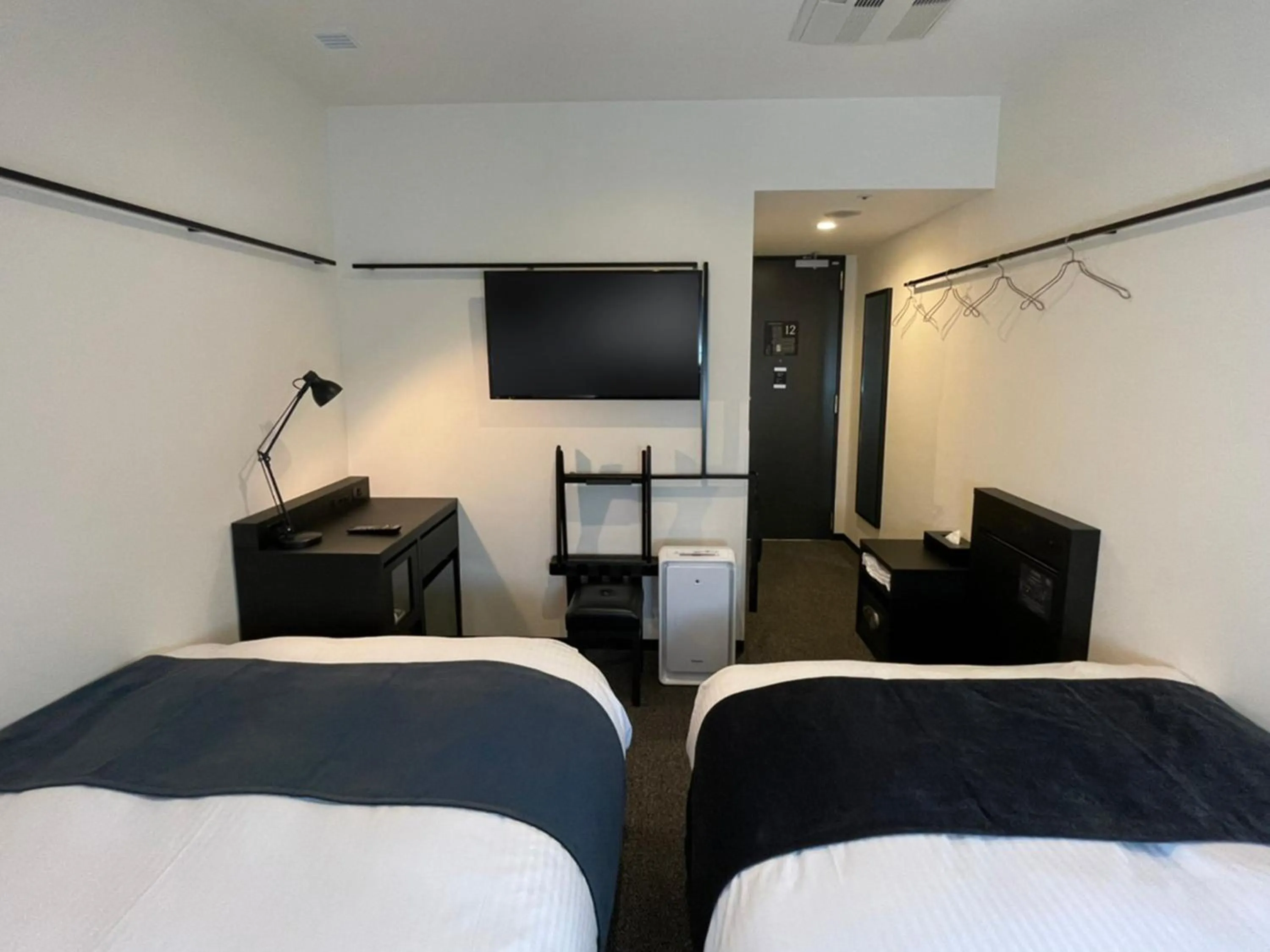 Bed in HOTEL SUI KANDA by ABEST