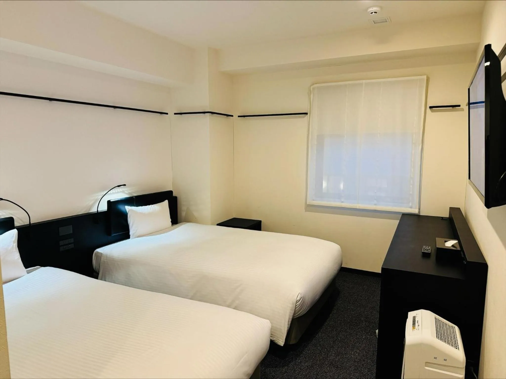 Bed in HOTEL SUI KANDA by ABEST